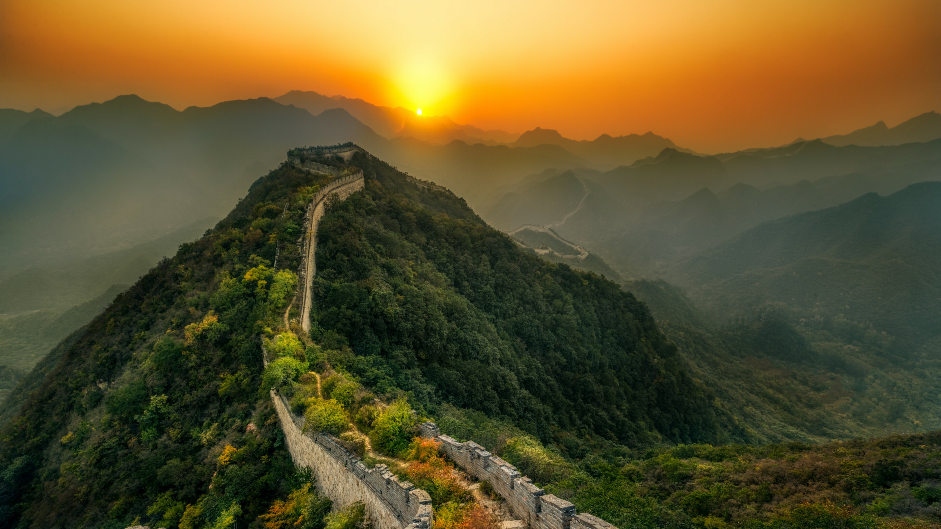 China: The Great Wall begins in the east at Shanhaiguan in Hebei province and ends at Jiayuguan in Gansu province to the west. 3840x2160 4K Wallpaper.