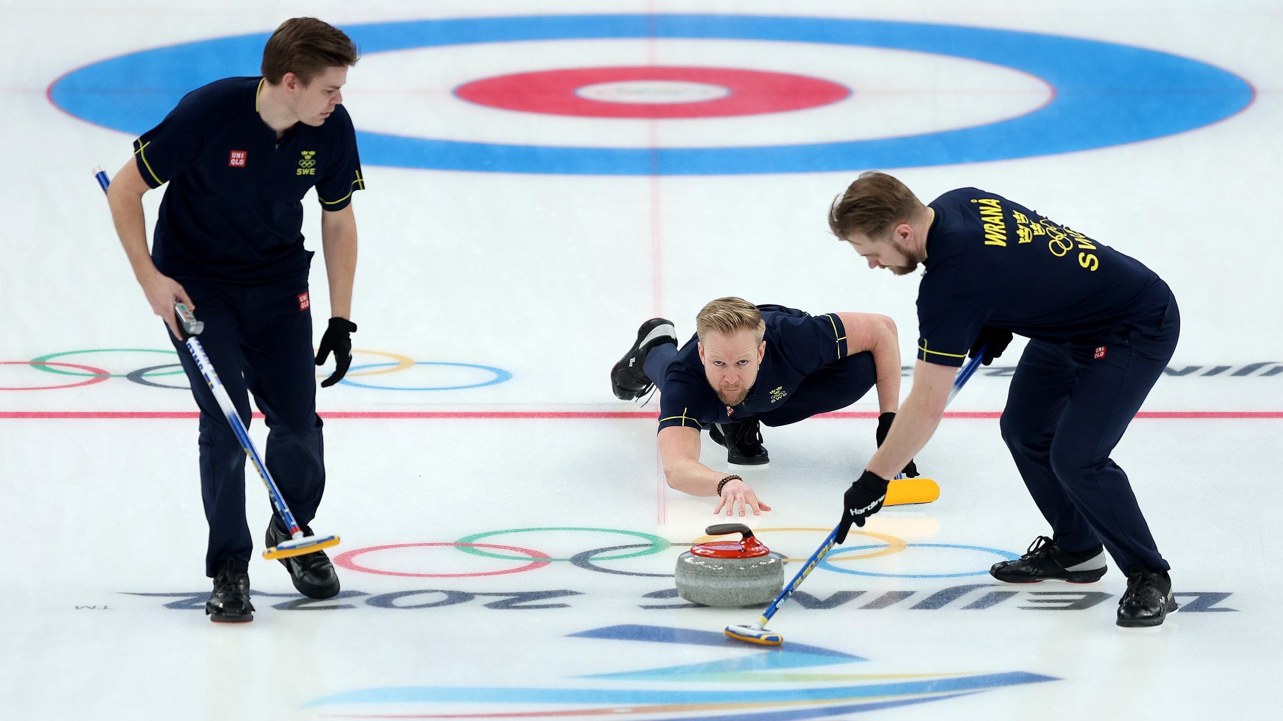 Curling: Rasmus Wrana, Niklas Edin, Oskar Eriksson, The Swedish national men's team, Beijing 2022. 2560x1440 HD Background.