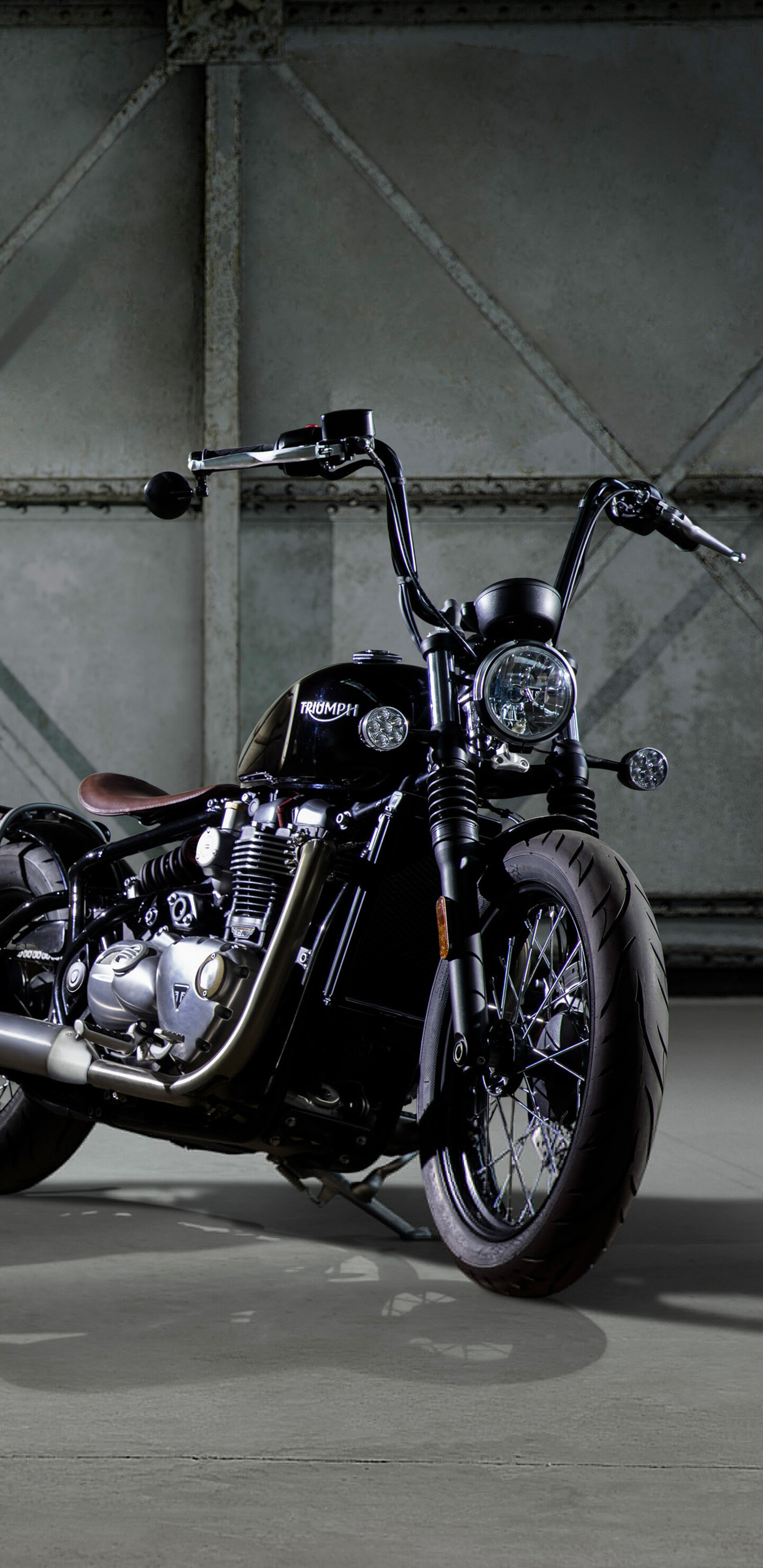 Triumph Motorcycles: Bonneville Bobber, Signature floating aluminum seat. 1440x2960 HD Background.