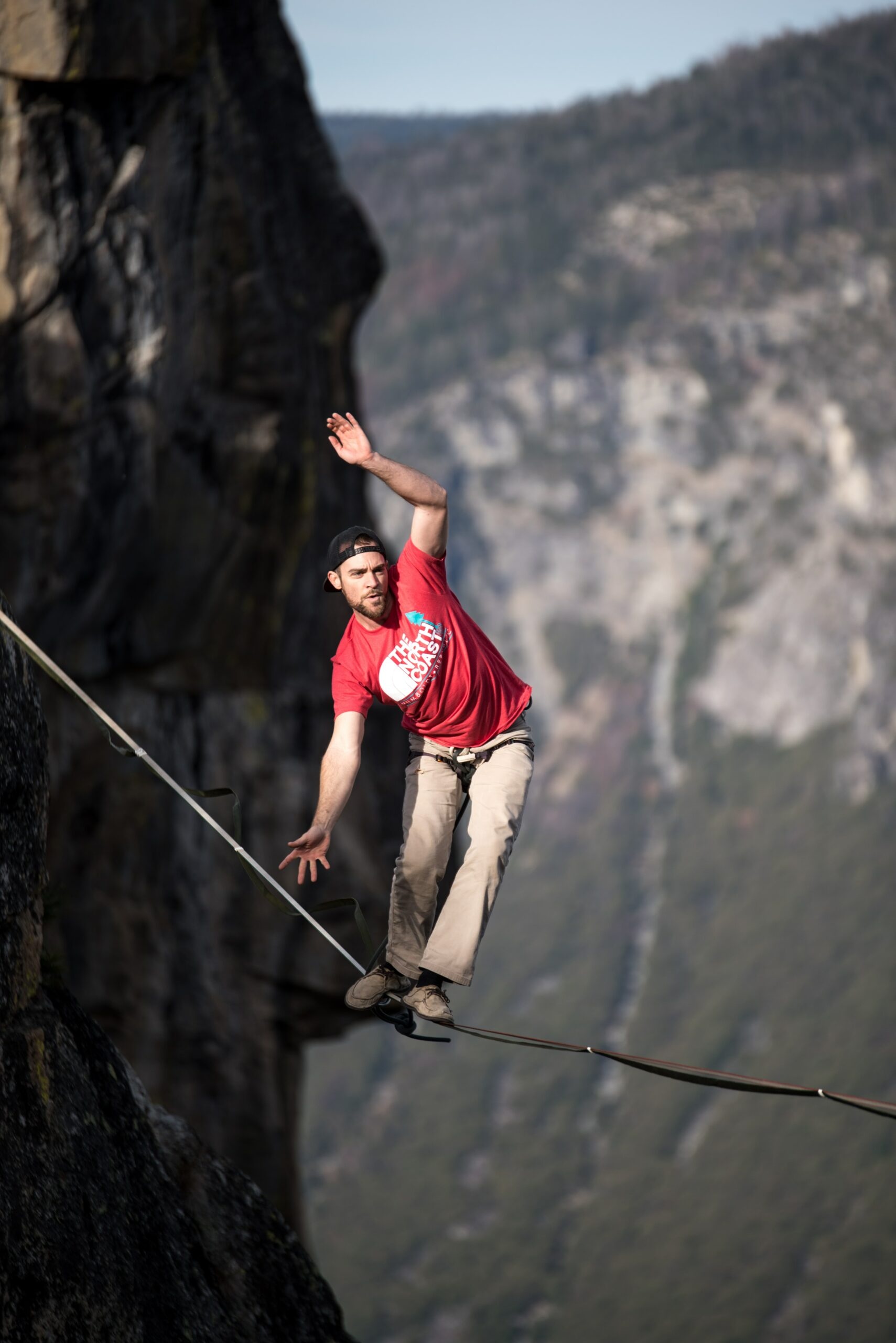 Slacklining: Thrill-seekers, Highline between mountains, An extreme challenge. 1710x2560 HD Wallpaper.