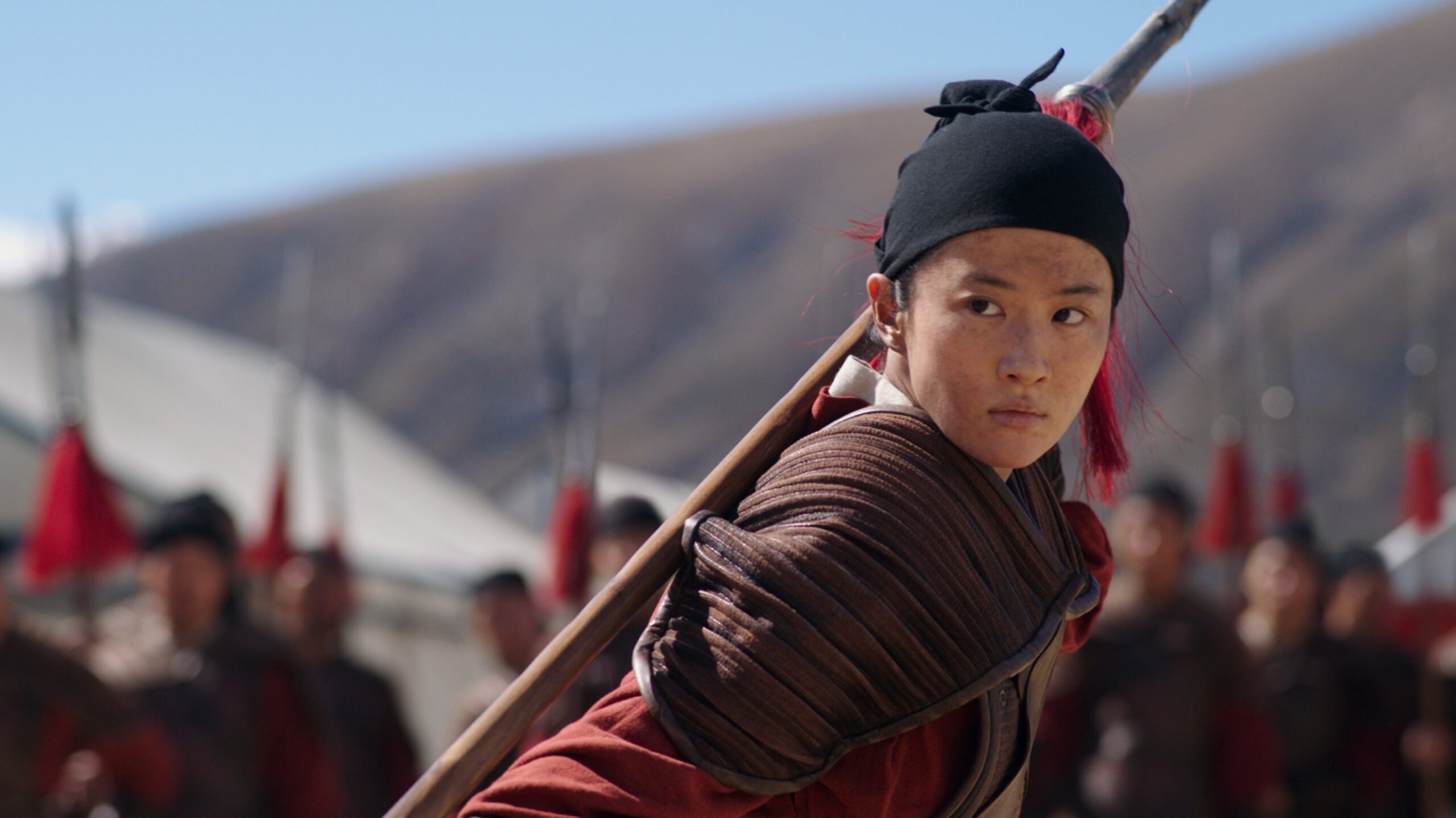 Mulan (Movie): The story of a girl who dresses as a man and joins the army. 2560x1440 HD Wallpaper.