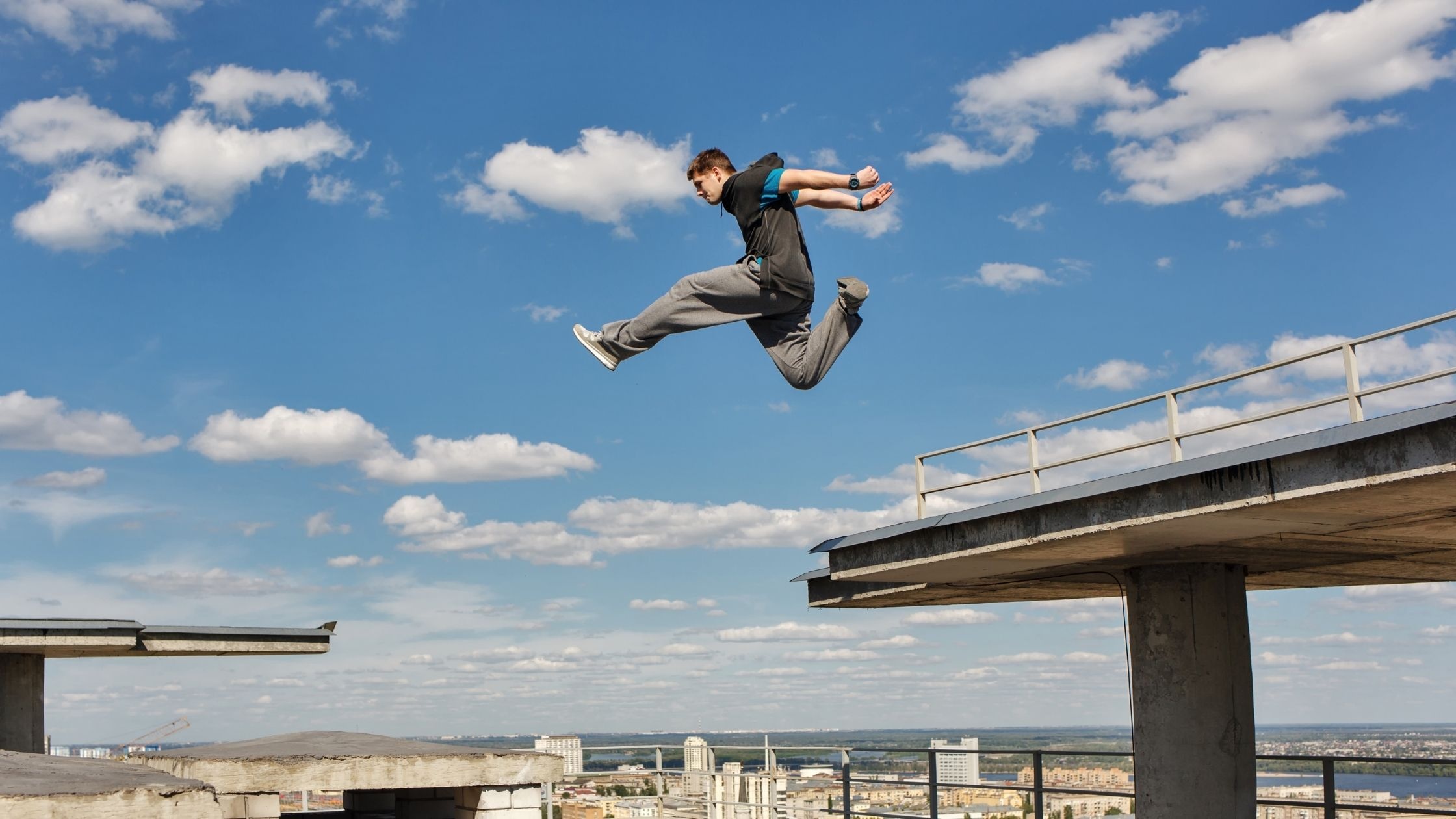 Parkour: Precision jumping, Action of high risk, Urban freerunning. 2240x1260 HD Background.