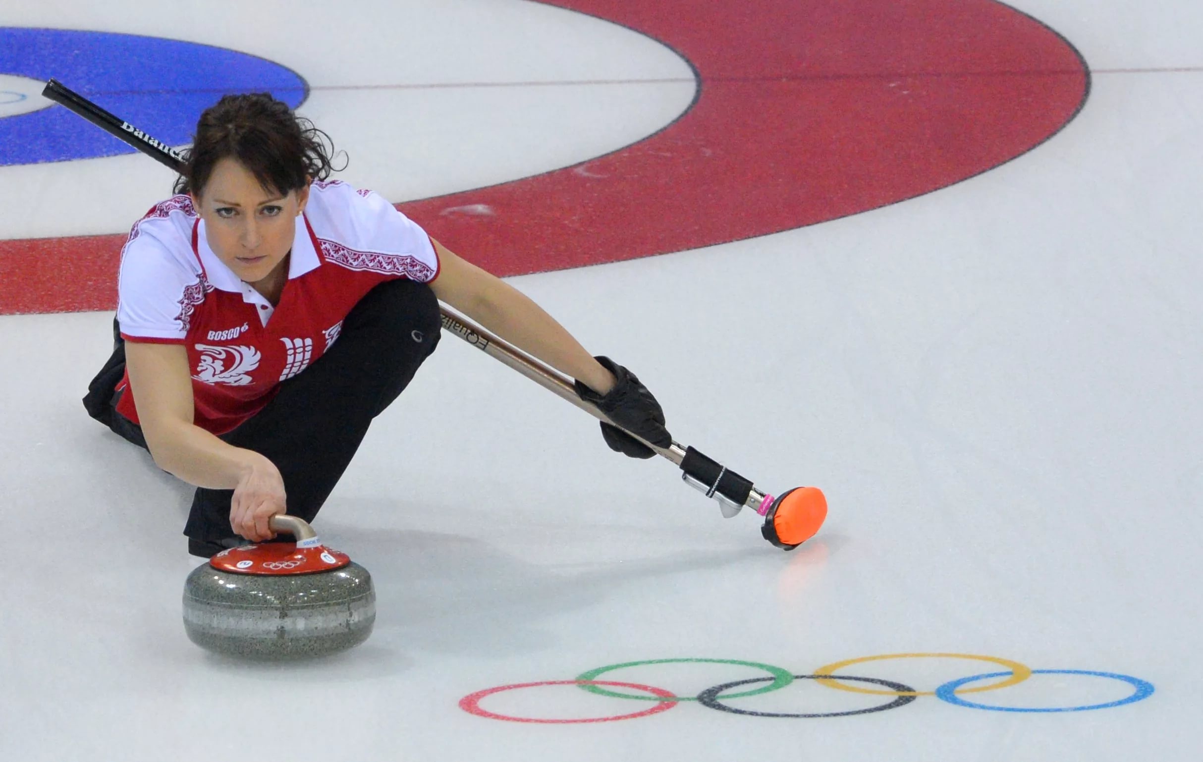 Curling: The skip prepares to launch the rock, An official winter Olympic sport. 2430x1540 HD Background.