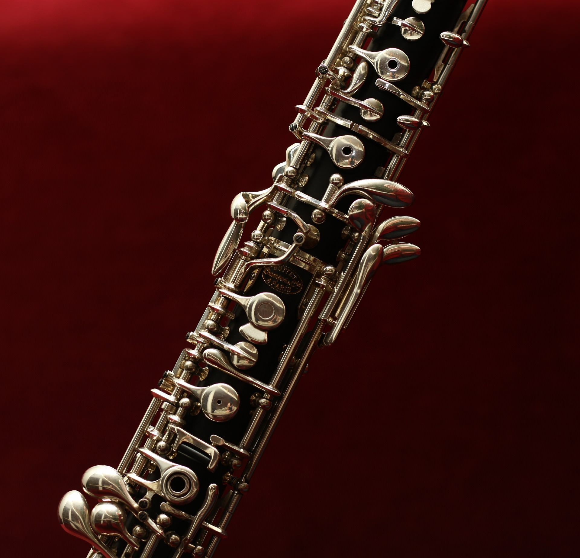 Oboe: A woodwind instrument having a usual range from B flat below middle C upward for over 2¹/₂ octaves. 1920x1850 HD Background.