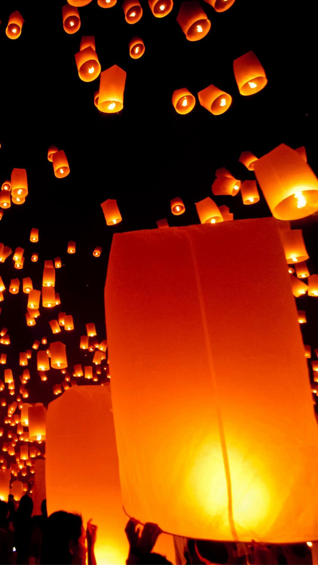 Festival: Public celebrations, Lighting lanterns symbolize "illuminating the future". 1080x1920 Full HD Background.