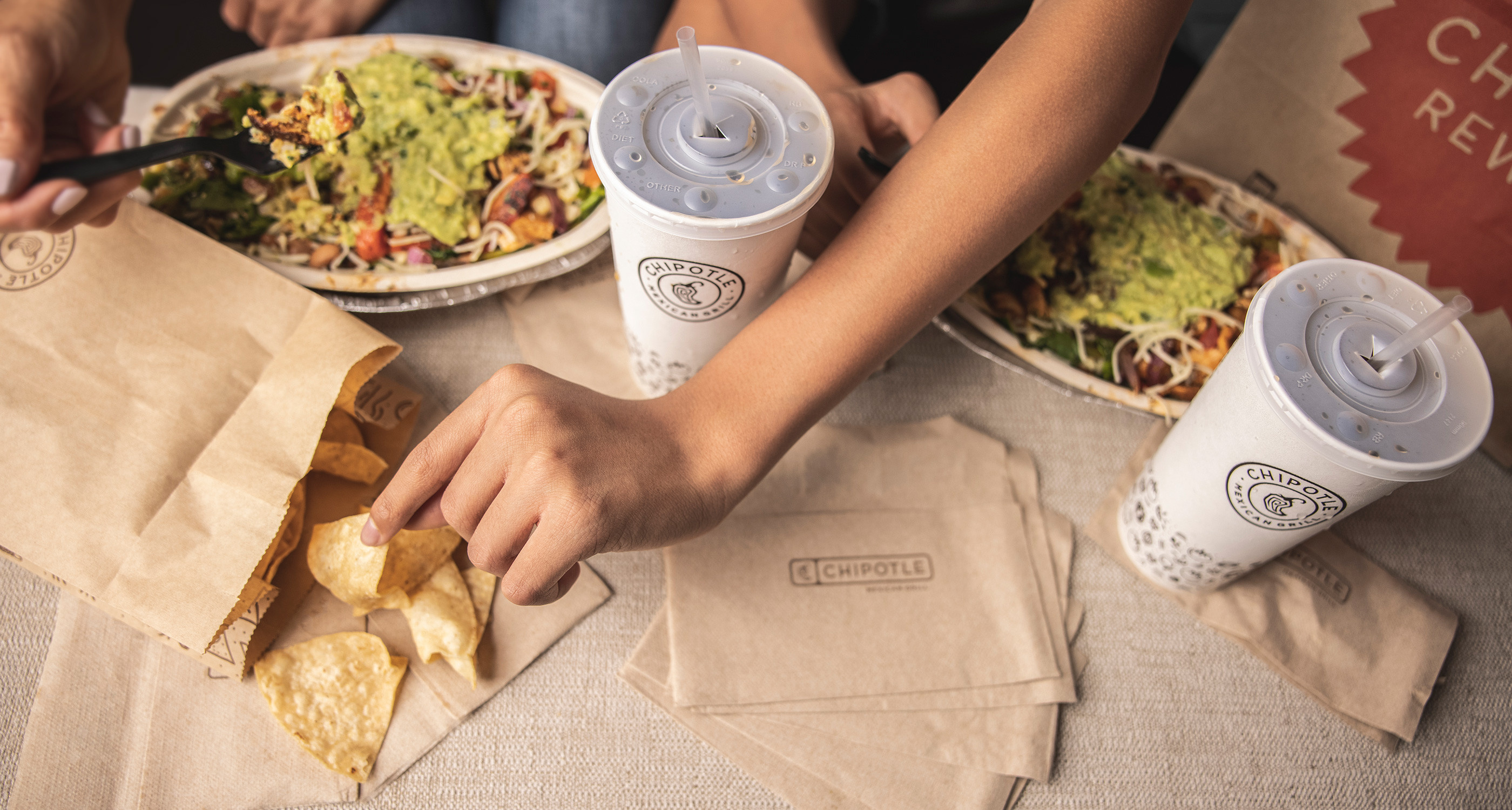 Chipotle: Fresh Mexican food restaurants throughout the U.S., Tortilla chips, Sodas, Fruit and tea drinks. 2800x1500 HD Background.