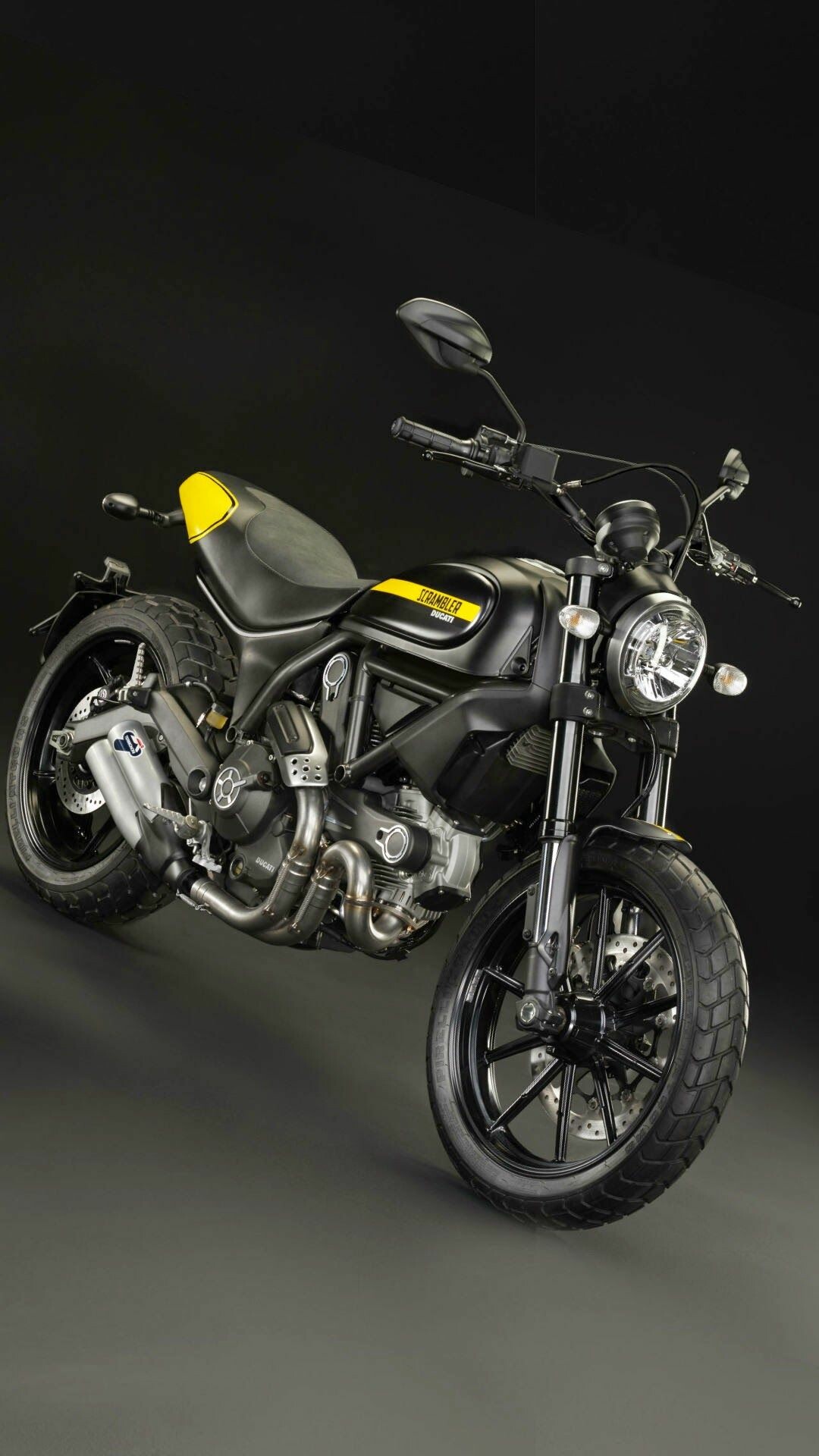 Ducati: The Scrambler, was introduced at the 2014, A V-twin engined roadster motorcycle. 1080x1920 Full HD Wallpaper.