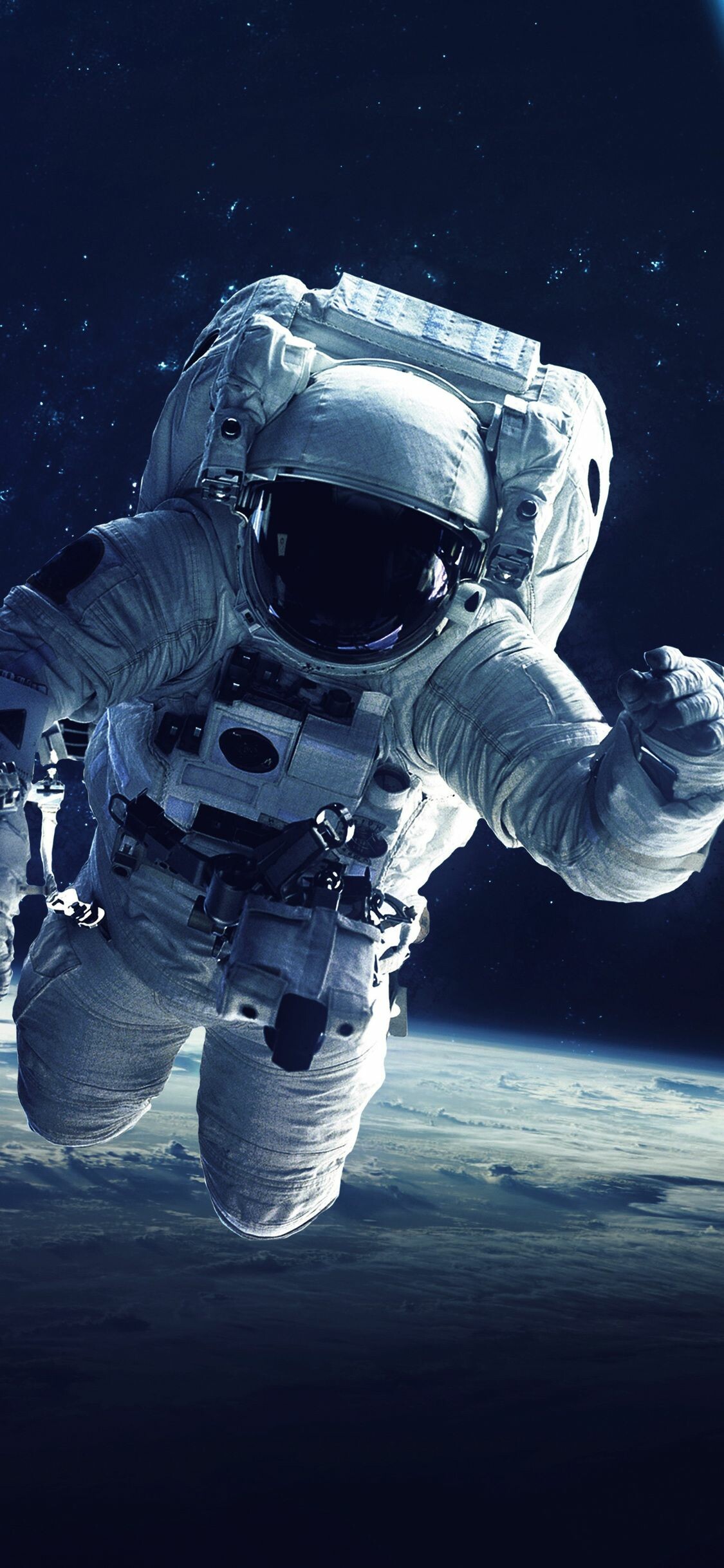 Astronaut: A person deployed by a human spaceflight program to serve aboard a spacecraft. 1130x2440 HD Background.