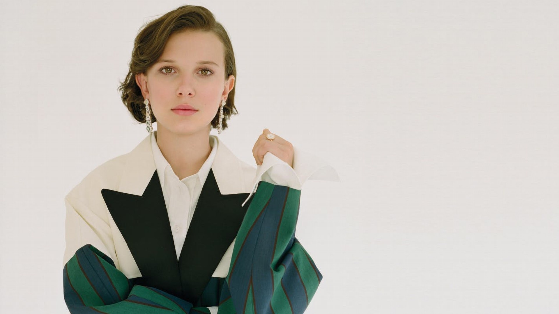 Millie Bobby Brown: Spanish-born British actress who portrays Eleven in the Netflix original series Stranger Things. 1920x1080 Full HD Background.