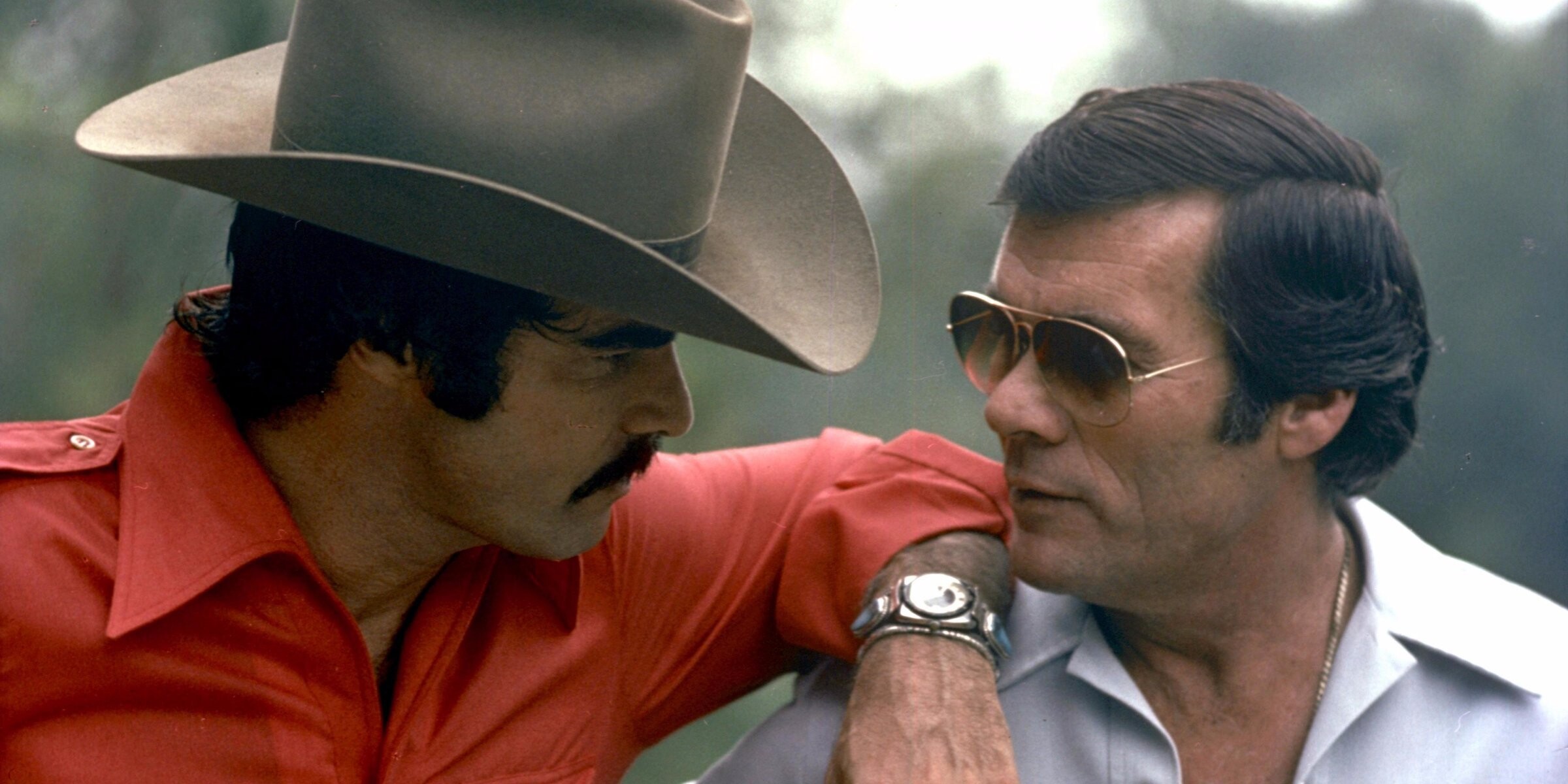 Burt Reynolds: The directorial debut of stuntman Hal Needham, The second highest-grossing domestic film of 1977. 2400x1200 Dual Screen Wallpaper.