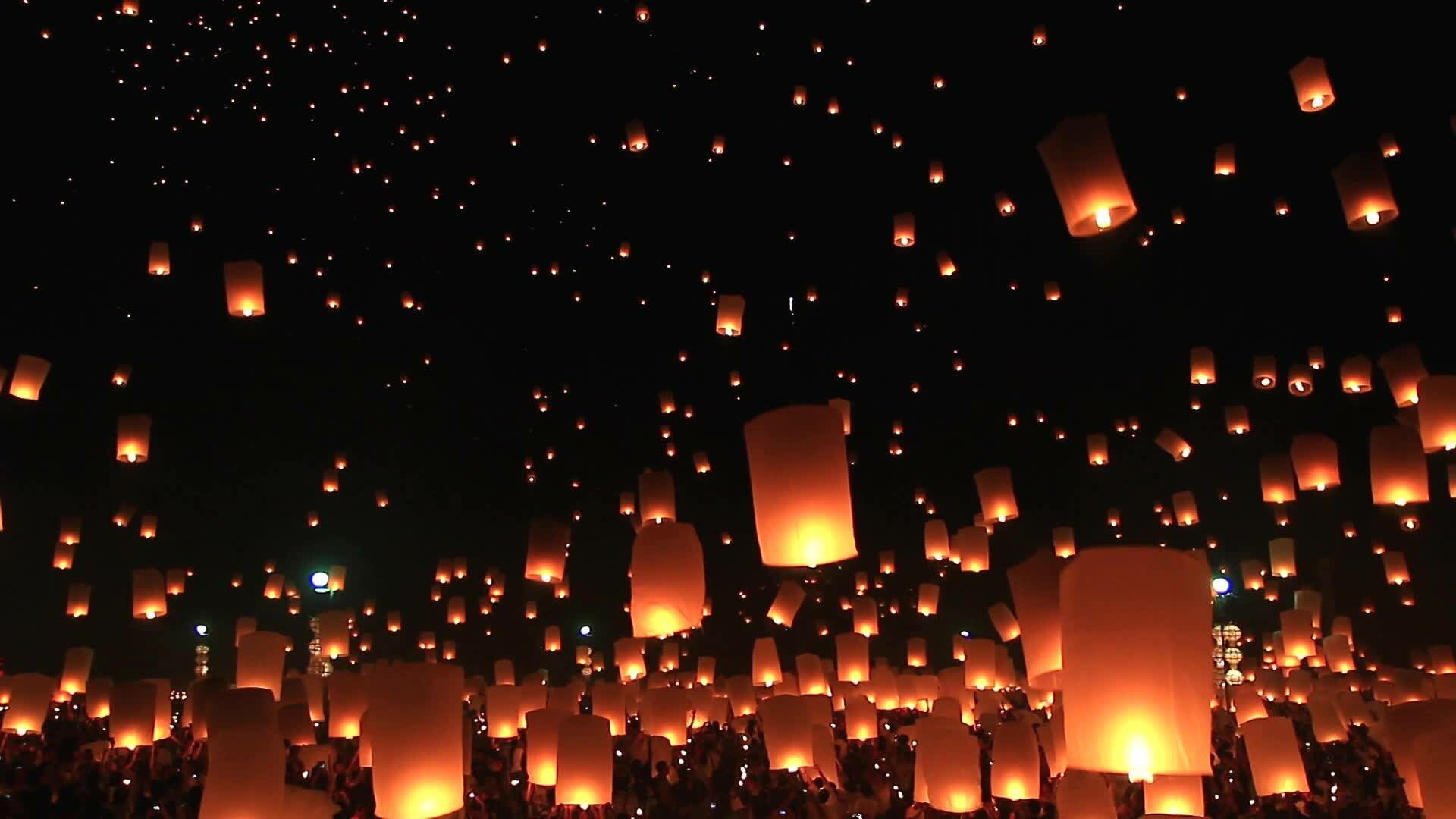Lantern Festival: Community celebrations, People lighting paper lanterns. 1920x1080 Full HD Background.
