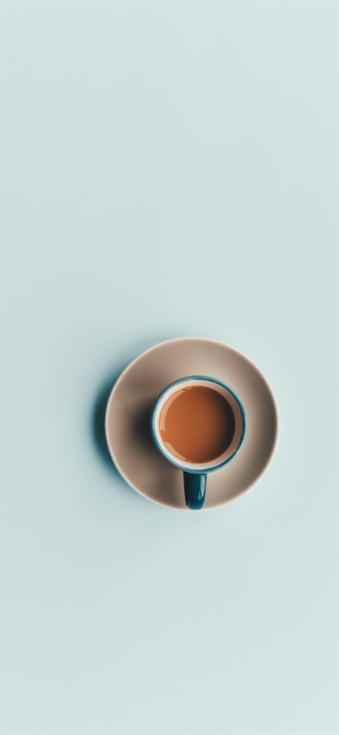 Ceramic coffee cup charm, Elegant saucer pairing, iPhone wallpaper scene, Blue and white delight, 1170x2540 HD Handy