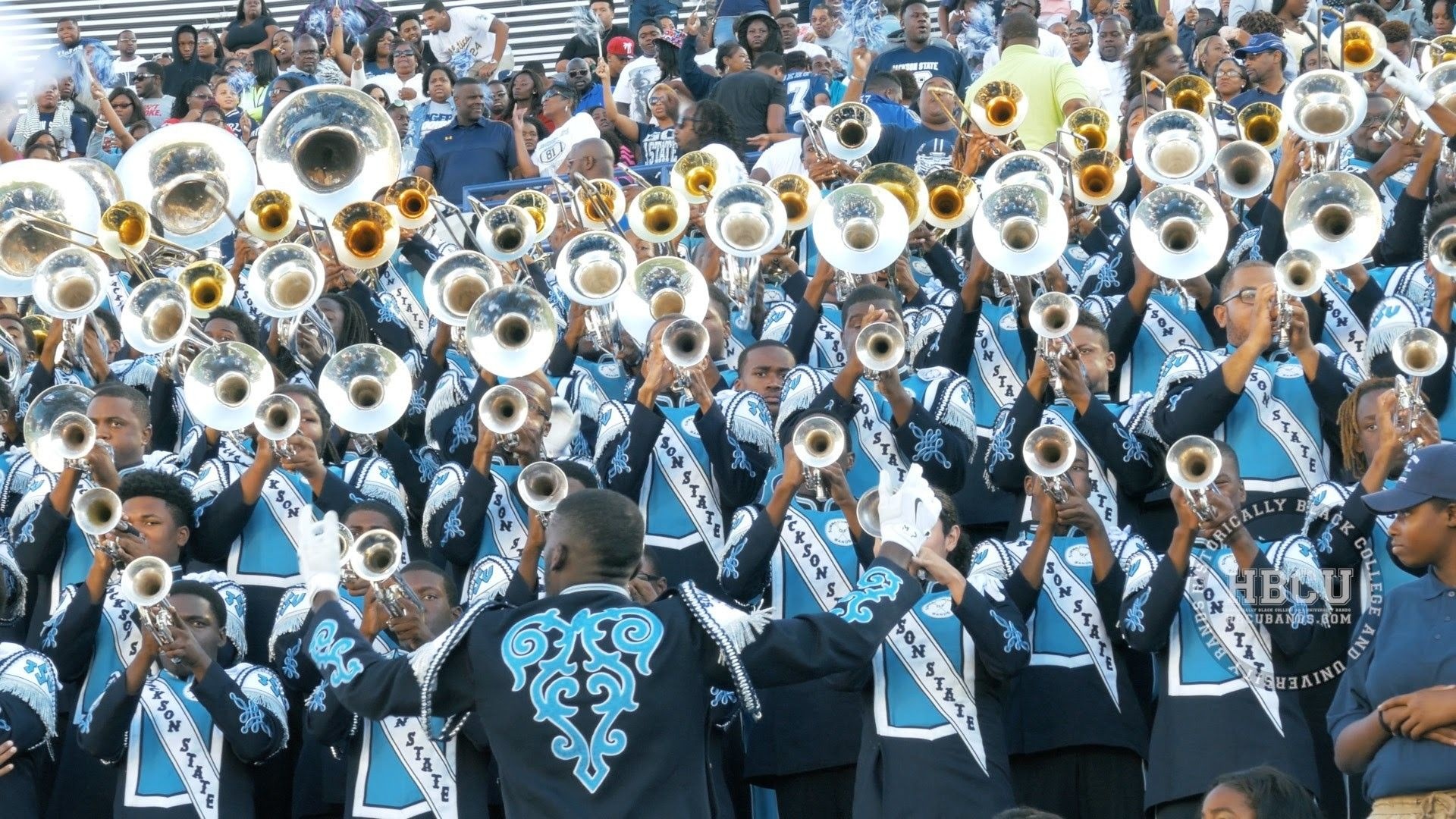 Marching Band: Jackson State University, Musicians play while walking together at a sports event, HBCU. 1920x1080 Full HD Wallpaper.