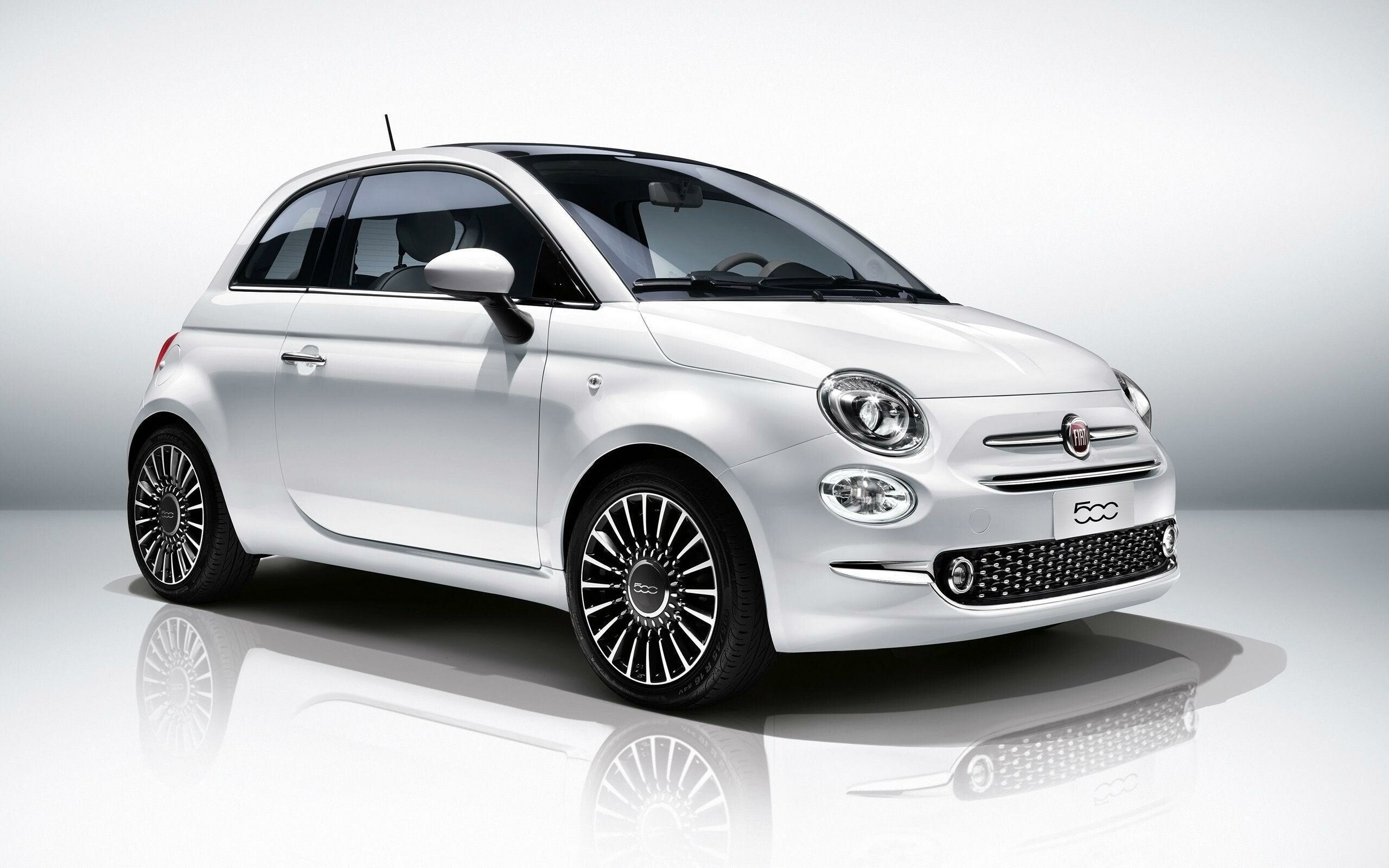 Fiat: Manufactured in Tychy, Poland, and Toluca, Mexico, the 500 is marketed in more than 100 countries worldwide. 2560x1600 HD Background.