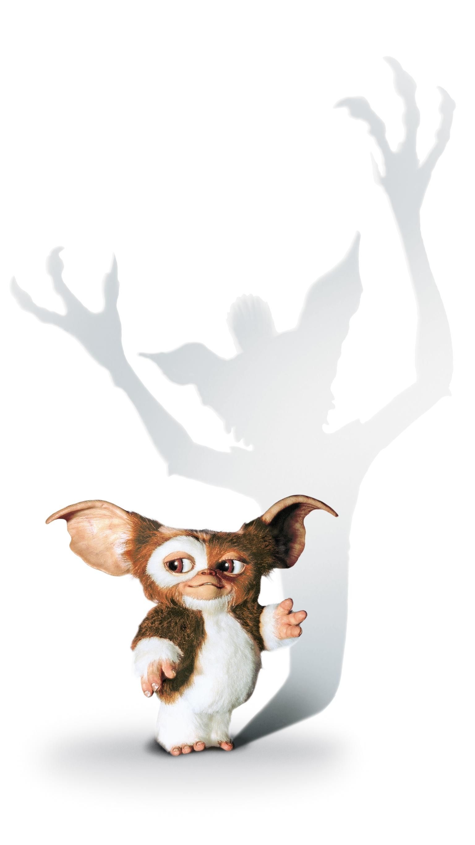 Gremlin: Small, furry creature with large ears, big eyes, and a cute appearance. 1540x2740 HD Wallpaper.