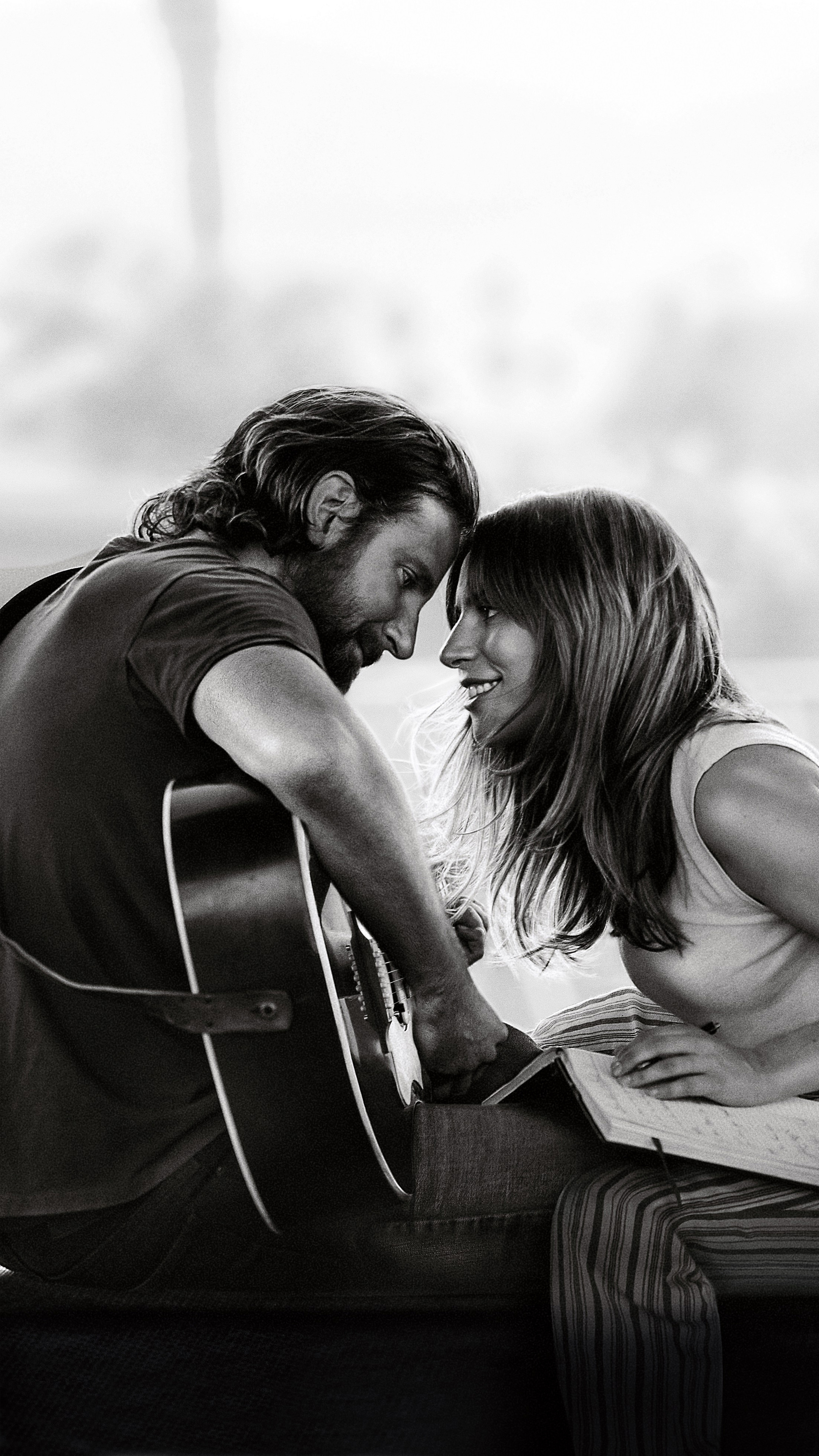 A Star Is Born: A 2018 American romantic drama film produced and directed by Bradley Cooper. 2160x3840 4K Background.