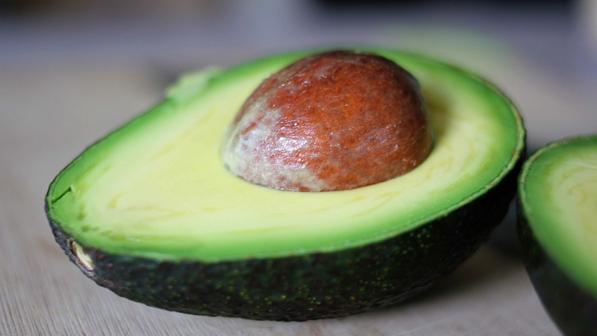 Avocado: An important part of traditional Mexican, Central American, and South American cuisine. 1920x1080 Full HD Background.