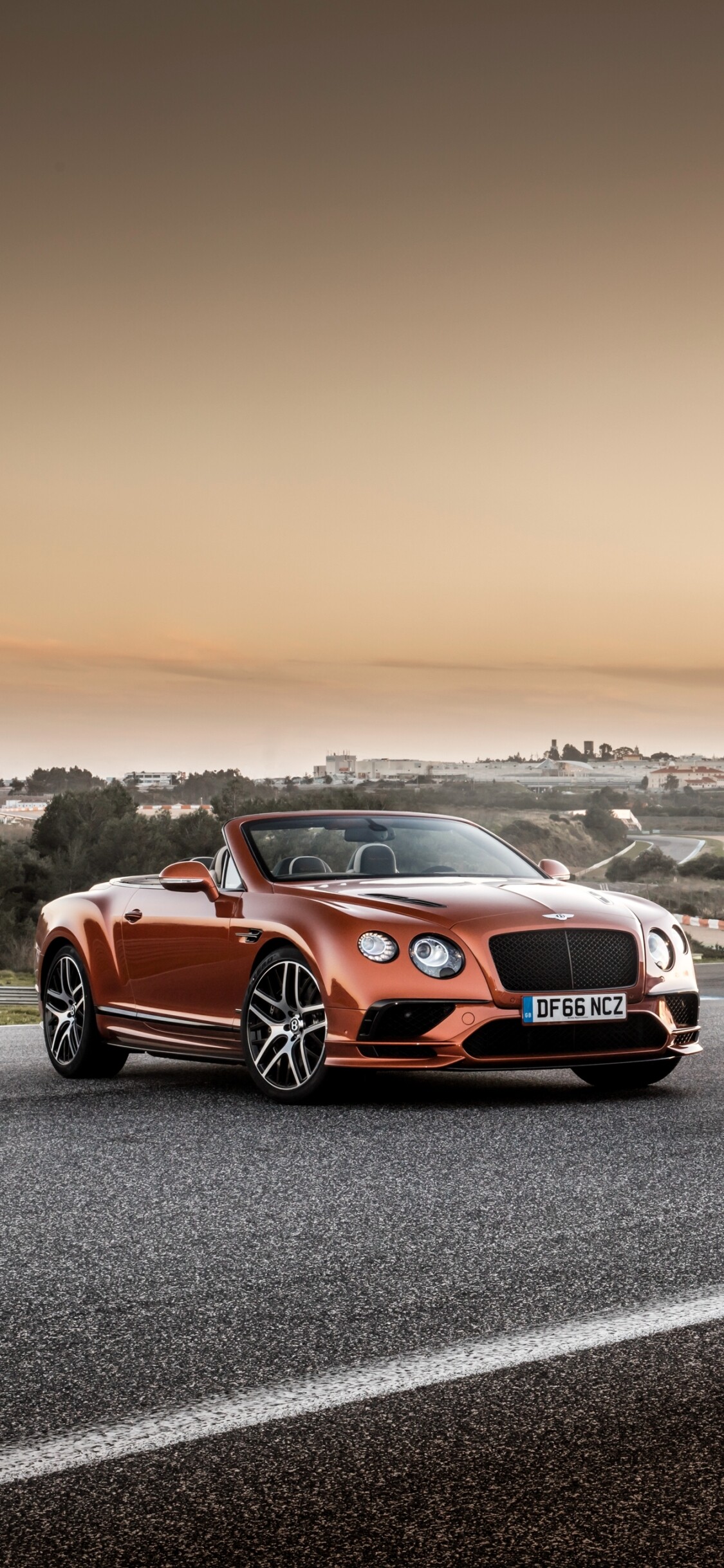 Bentley: The super luxurious car brand, Land vehicle. 1130x2440 HD Wallpaper.