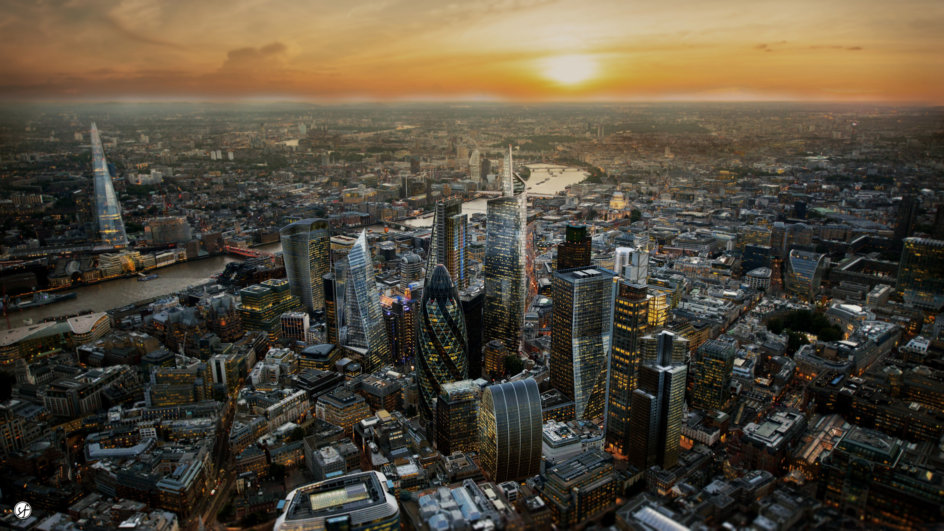 Skyline: Aerial view of the City - the central business district of London, The Thames river. 3840x2160 4K Background.