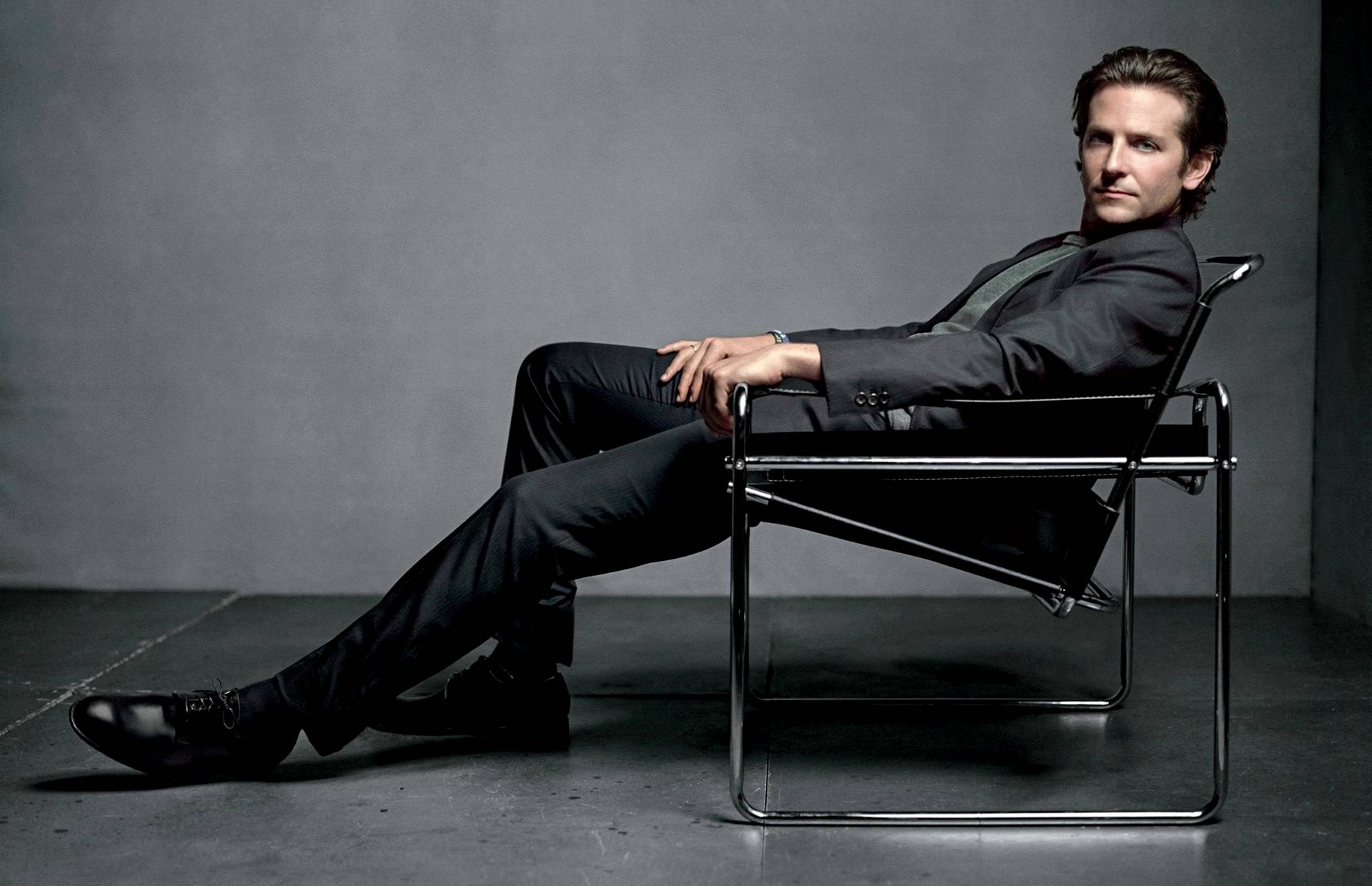 Bradley Cooper, Stylish suit, Elegant chair, Actor's charm, 1920x1240 HD Desktop