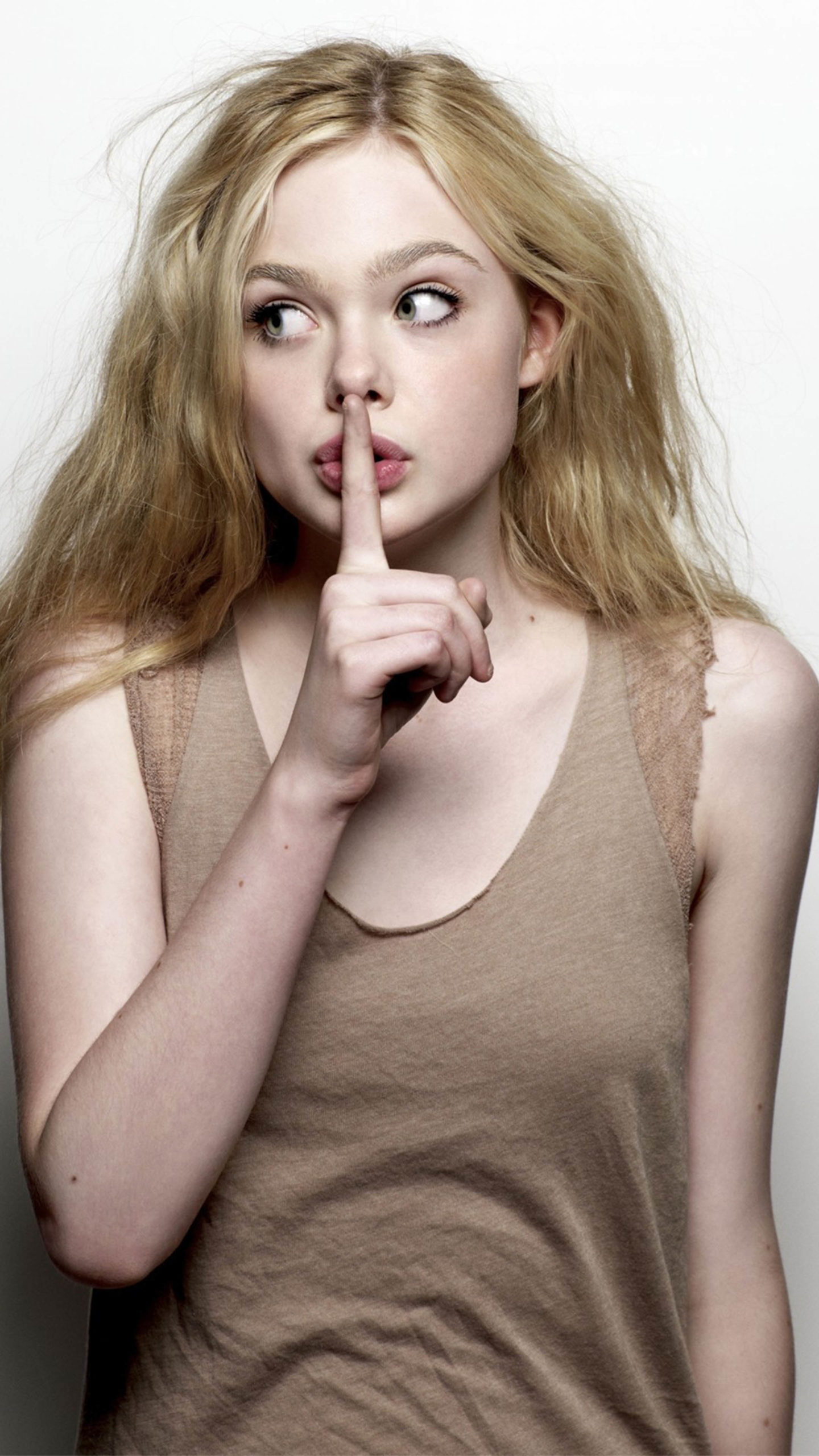Elle Fanning: Went on to portray Virginia "V" in a 2011 horror film, Twixt. 1440x2560 HD Background.