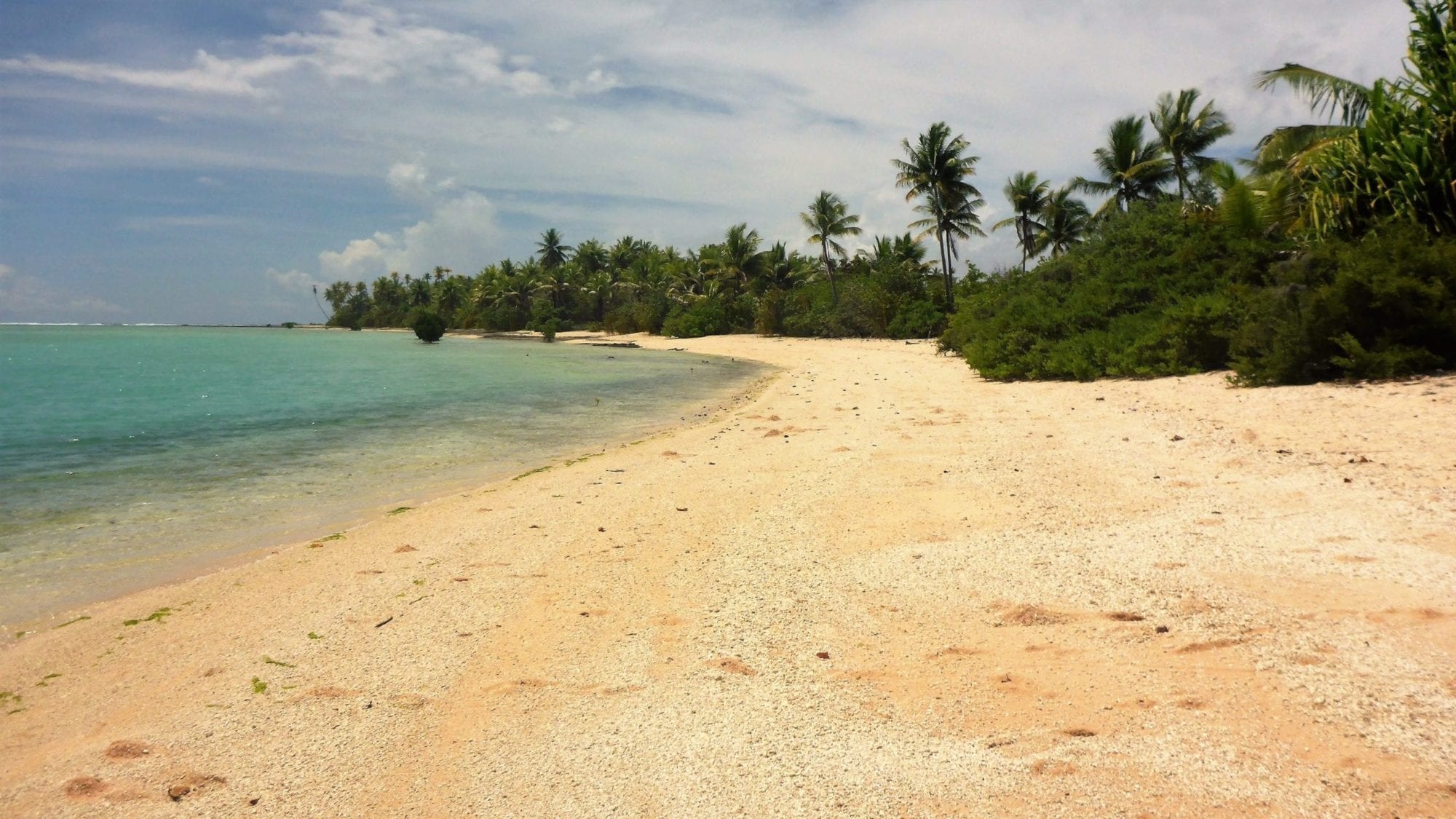 South Tarawa, Beach on the lagoon, Serene coastal scenery, Kiribati paradise, 2000x1130 HD Desktop