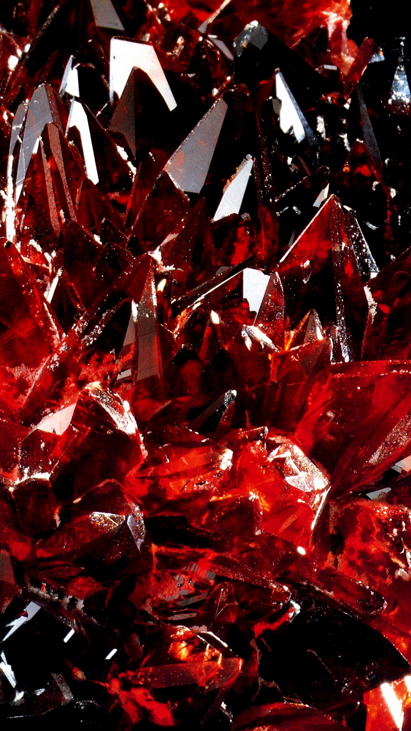 Gemstone: Amber, A mineral or crystal that can be cut and polished for use as a jewel. 1440x2560 HD Background.
