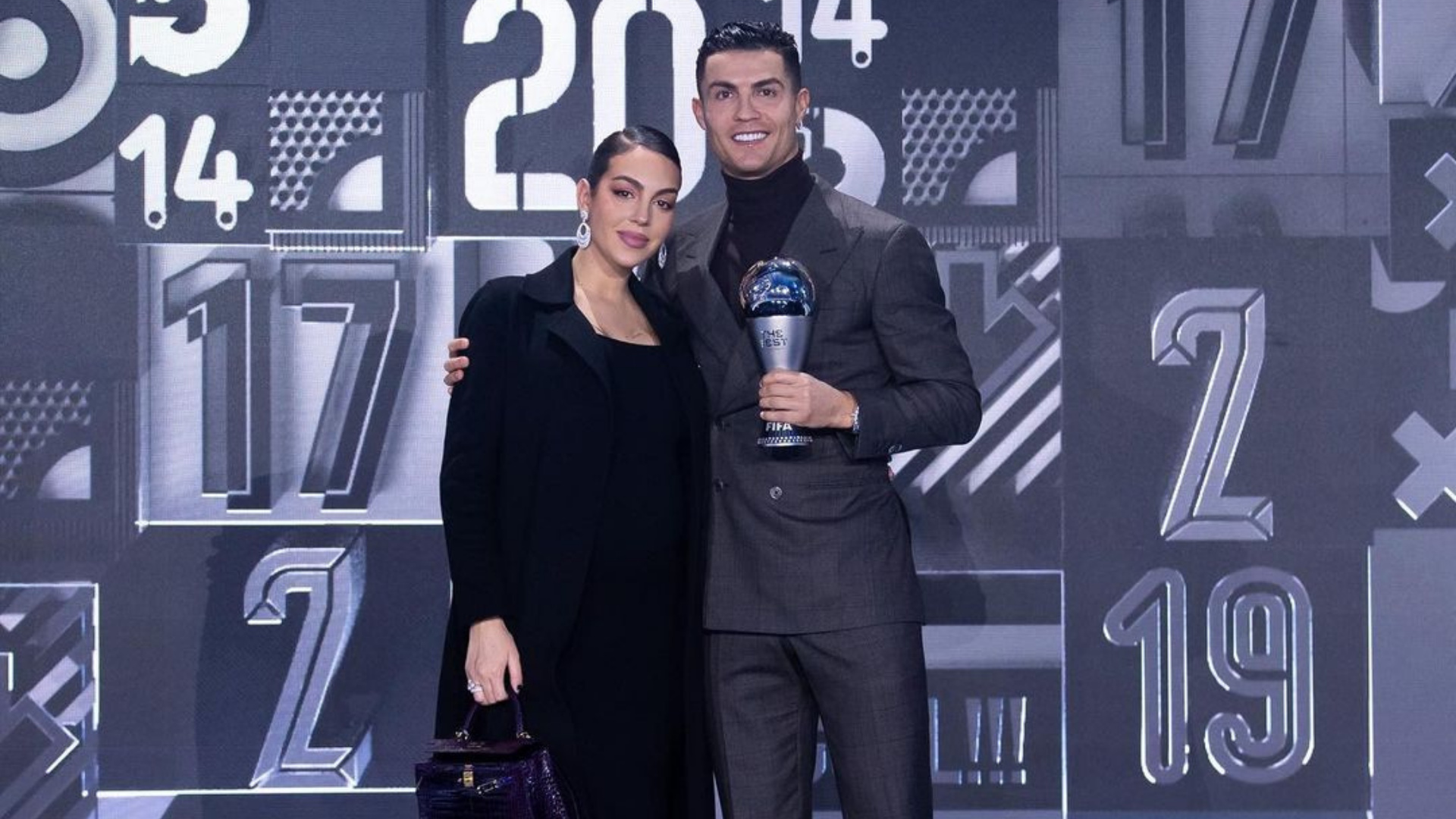 Cristiano Ronaldo and Georgina Rodriguez: The most prolific goalscorer in the history of the elite professional game. 1920x1080 Full HD Background.