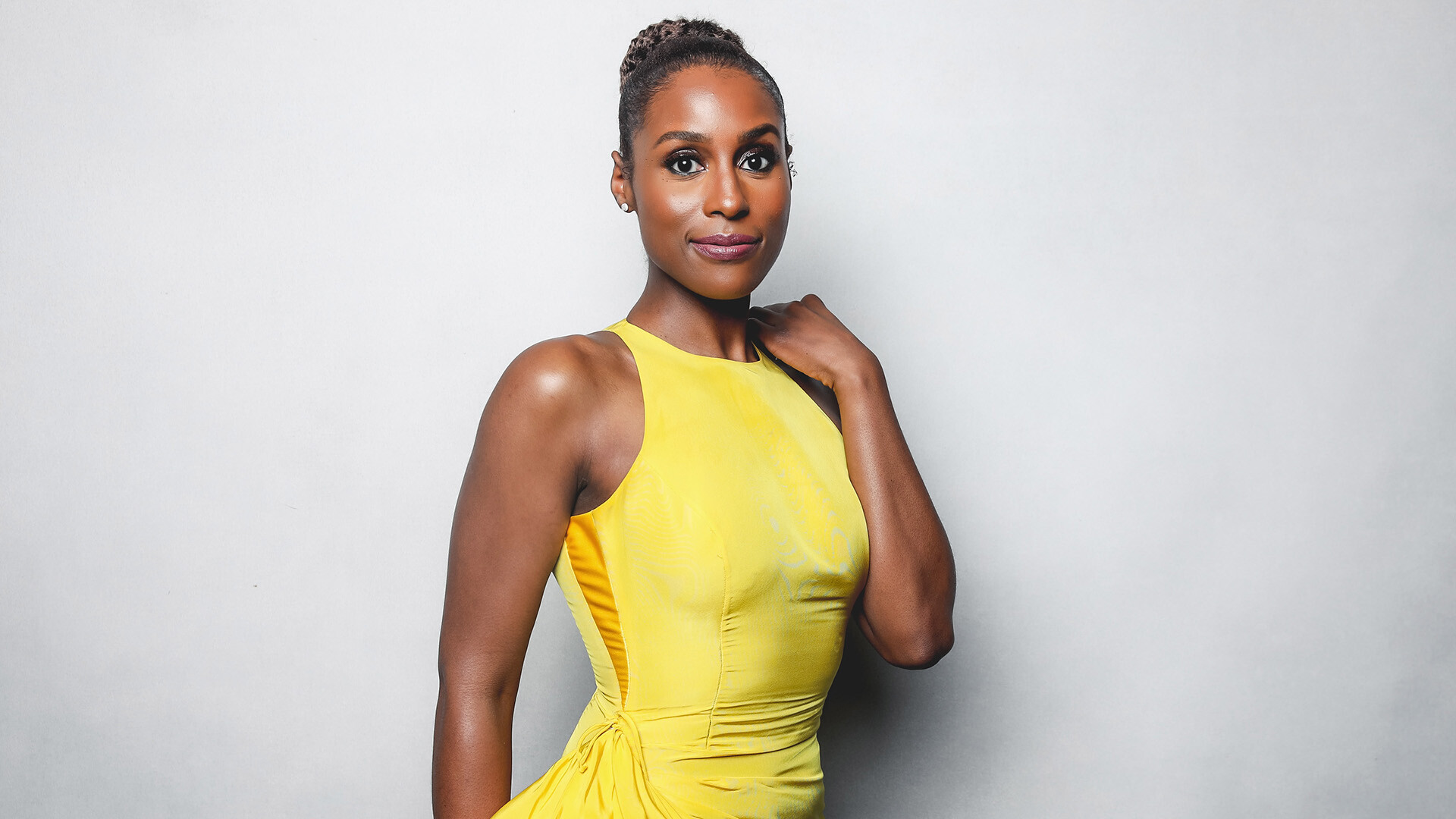 Issa Rae: An American performer who played the role of April Ofrah in 2018 movie The Hate U Give. 1920x1080 Full HD Background.