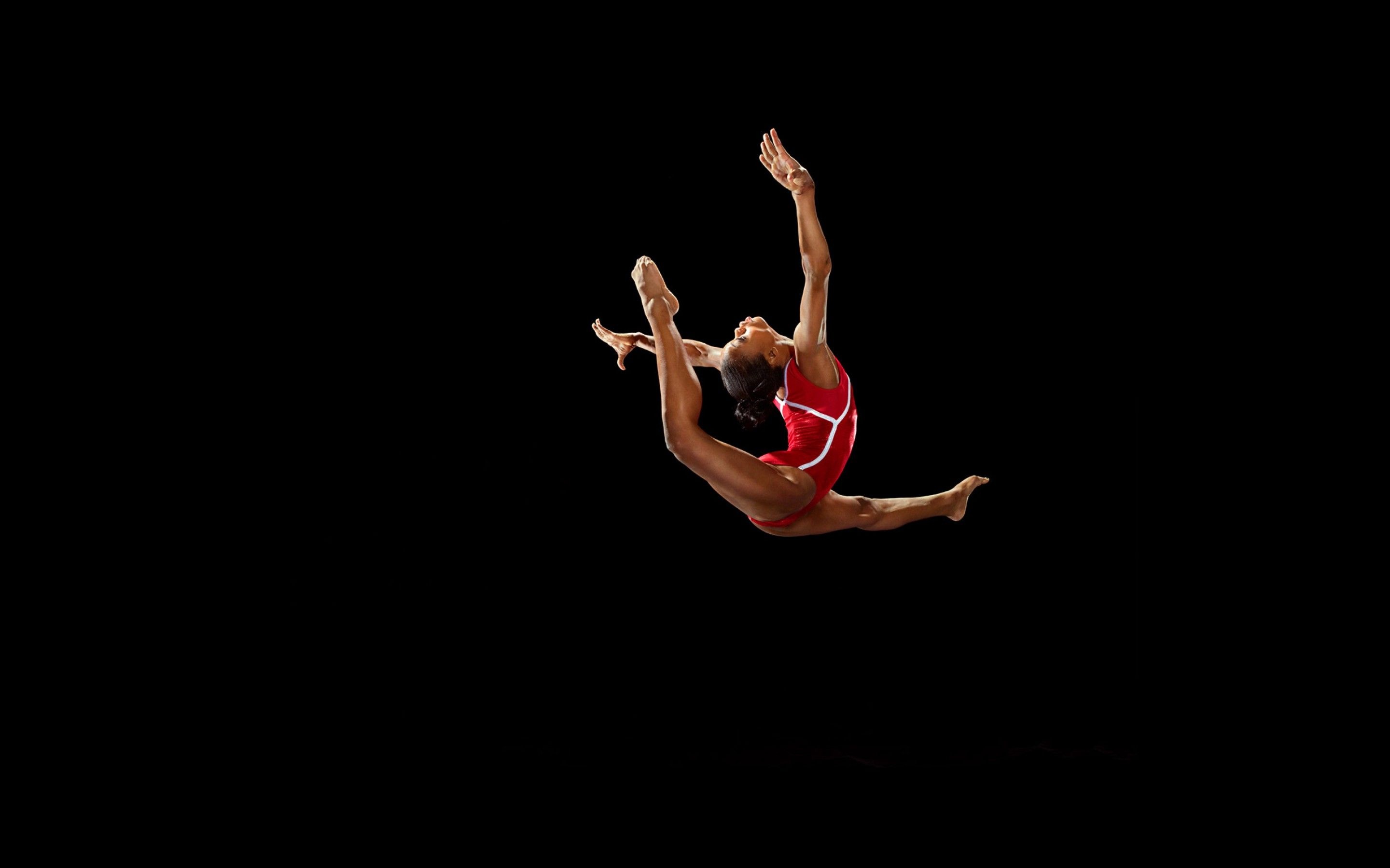 Acrobatic Gymnastics: Gabby Douglas, A retired American artistic gymnast, The 2012 Olympic all-around champion. 2880x1800 HD Background.