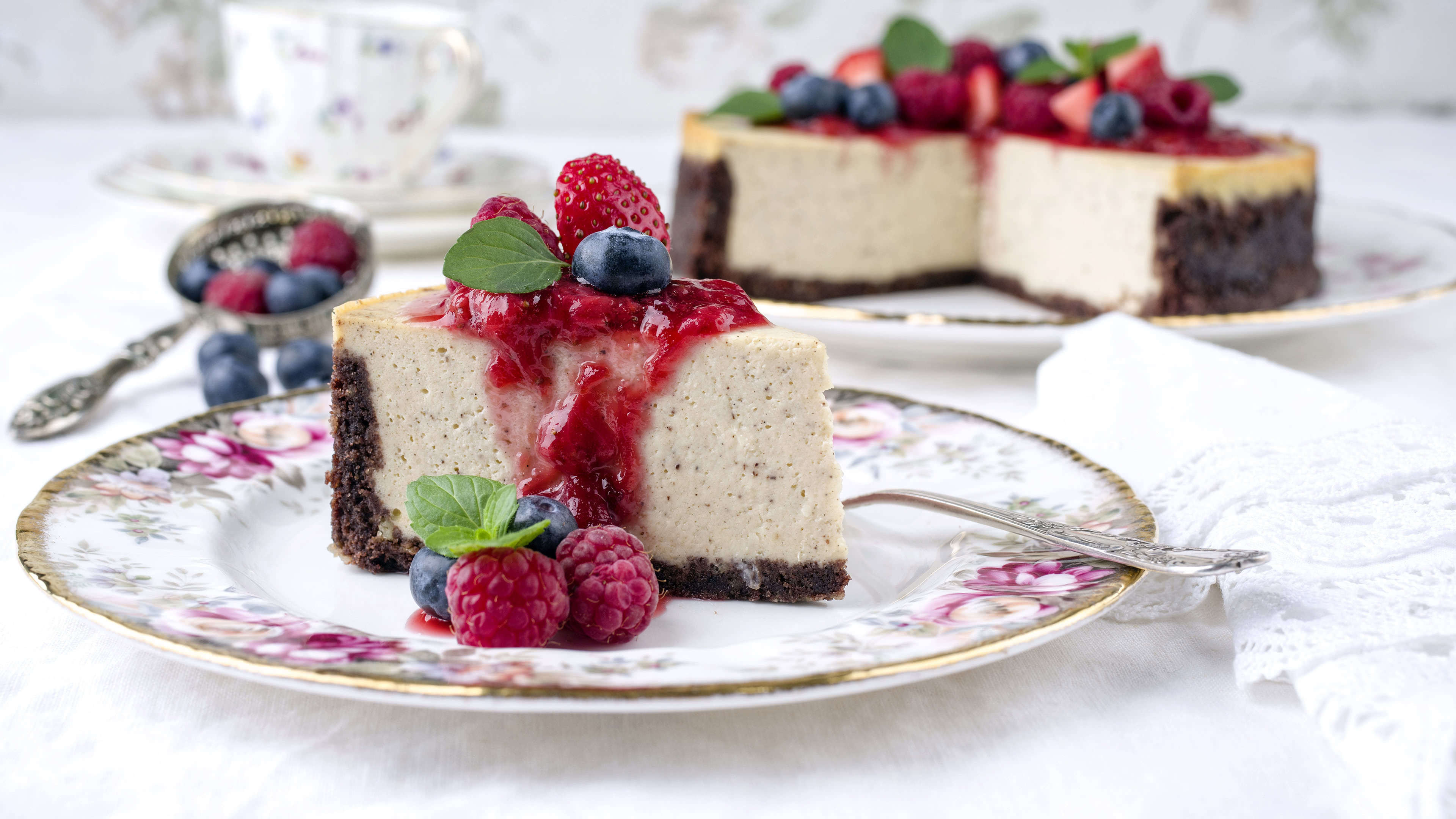Cheesecake: A sweet dessert consisting of a mixture of soft, fresh cheese, eggs, and sugar. 3840x2160 4K Background.