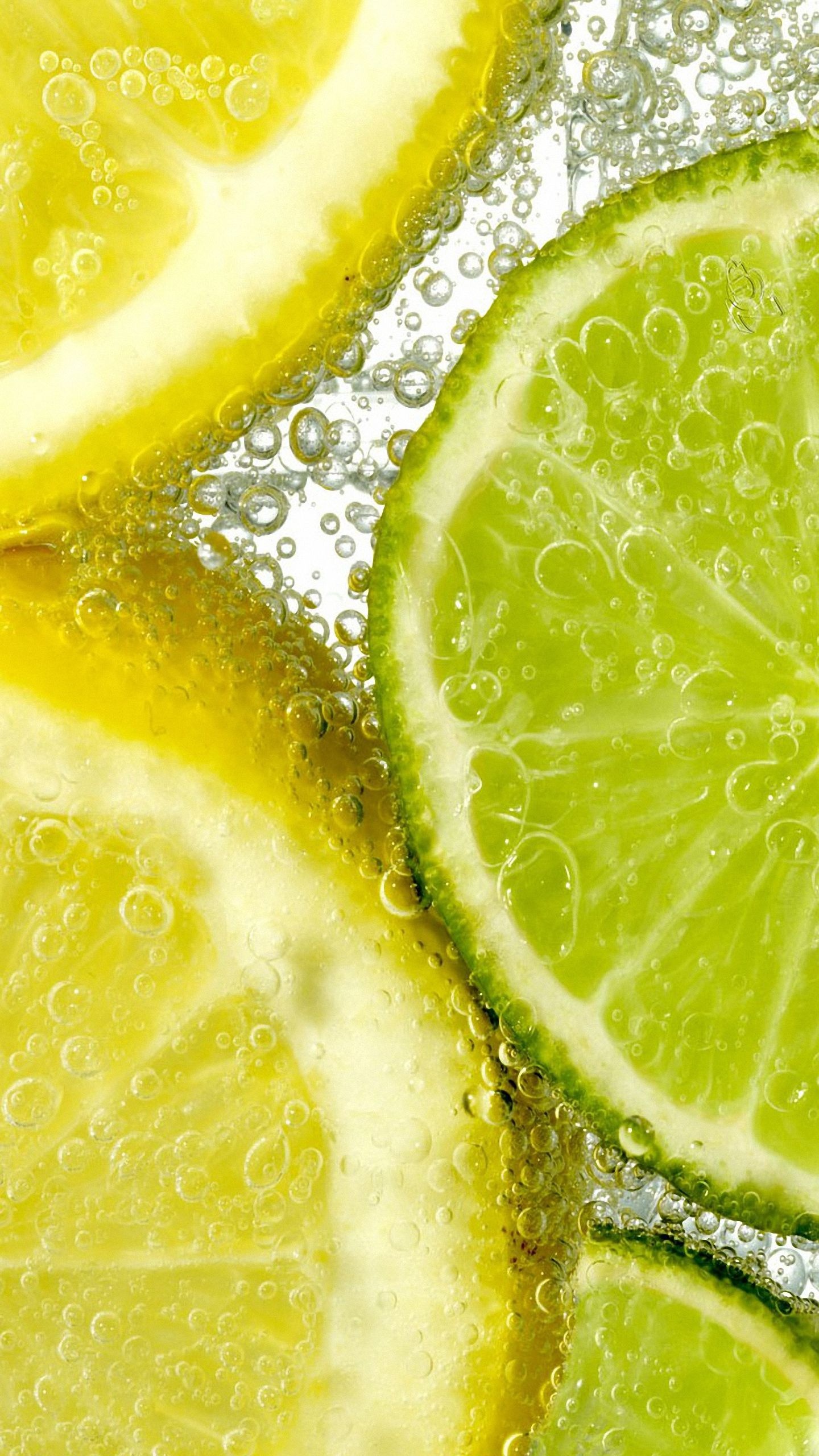 Lemon: Used to make lemonade, soft drinks, and cocktails, Lemony. 1440x2560 HD Background.