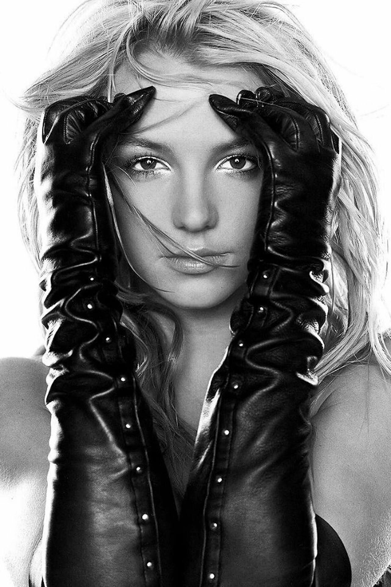 Britney Spears: Self-titled third studio album, Britney, Released in November 2001. 1280x1920 HD Background.