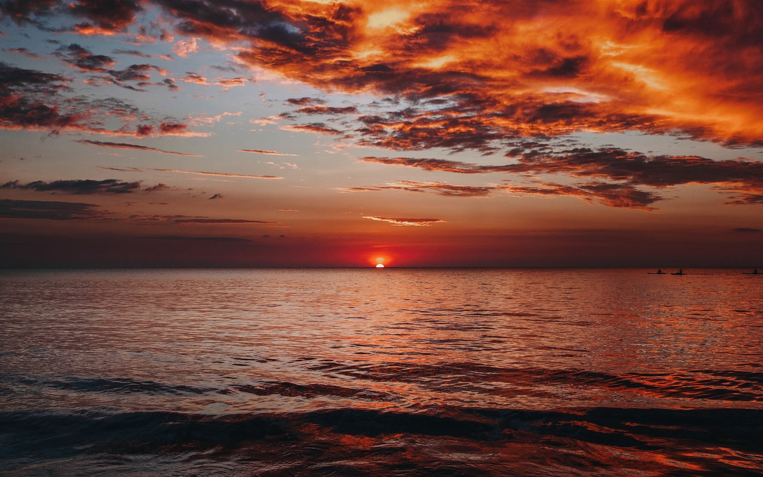 Sunset: Sundown, The scattering of sunlight, The sun breaking through a dark-bottomed cloud. 2560x1600 HD Wallpaper.