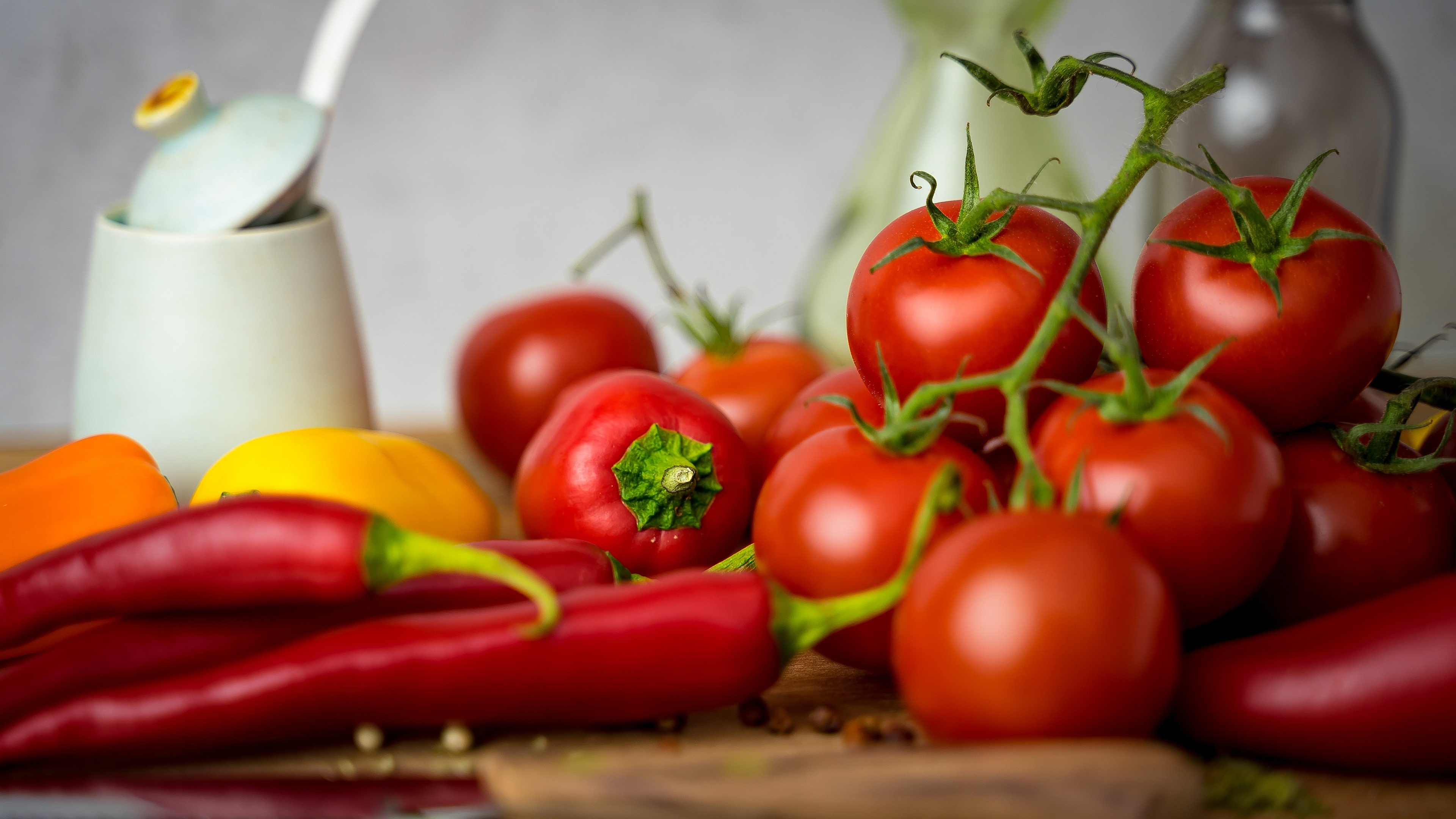 Vegetables: Tomato, Solanum lycopersicum, cultivated extensively for its edible fruits. 3840x2160 4K Background.