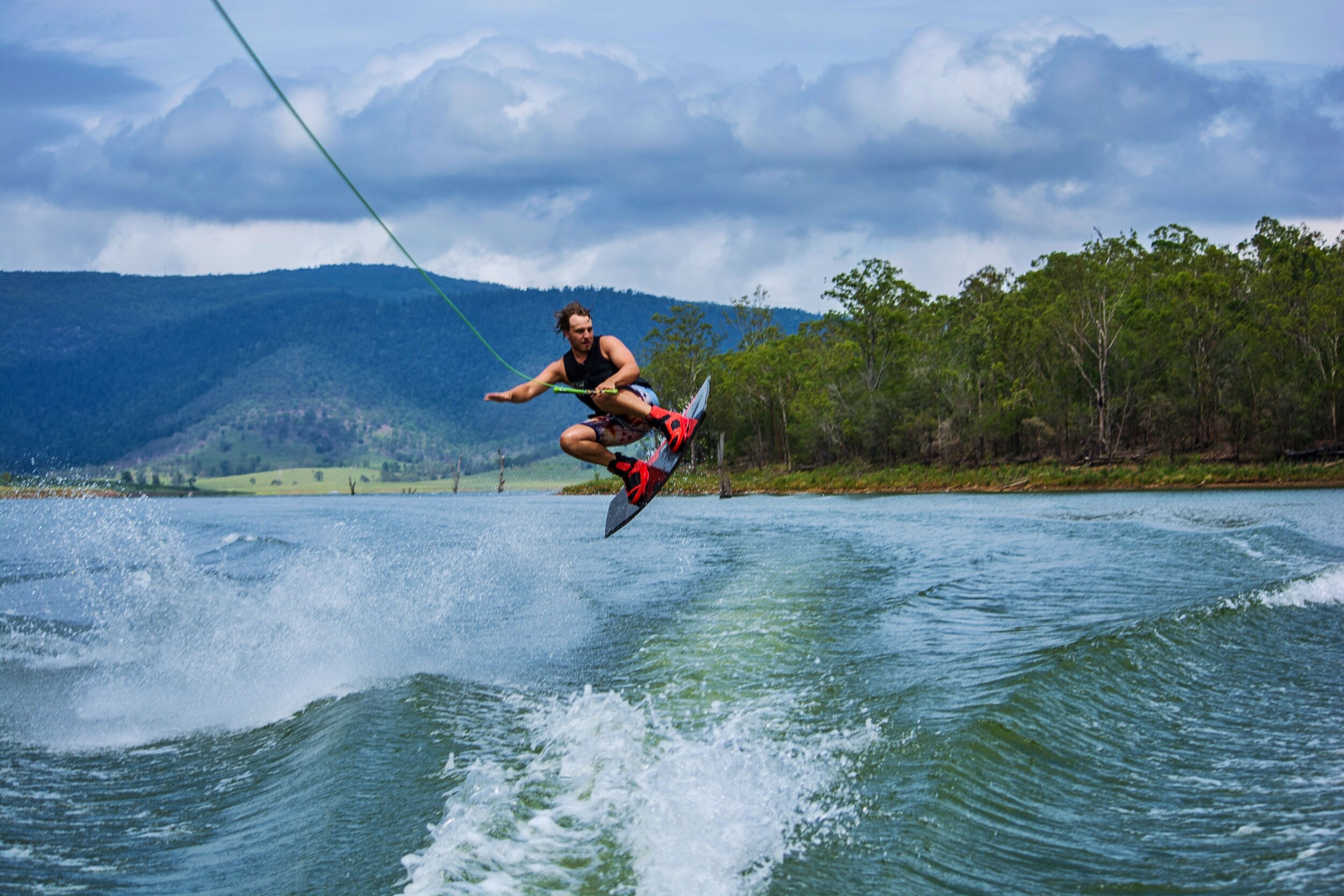 Wakeboarding: Jumping the wake - one of the favorite ocean lovers' trick. 2500x1670 HD Wallpaper.