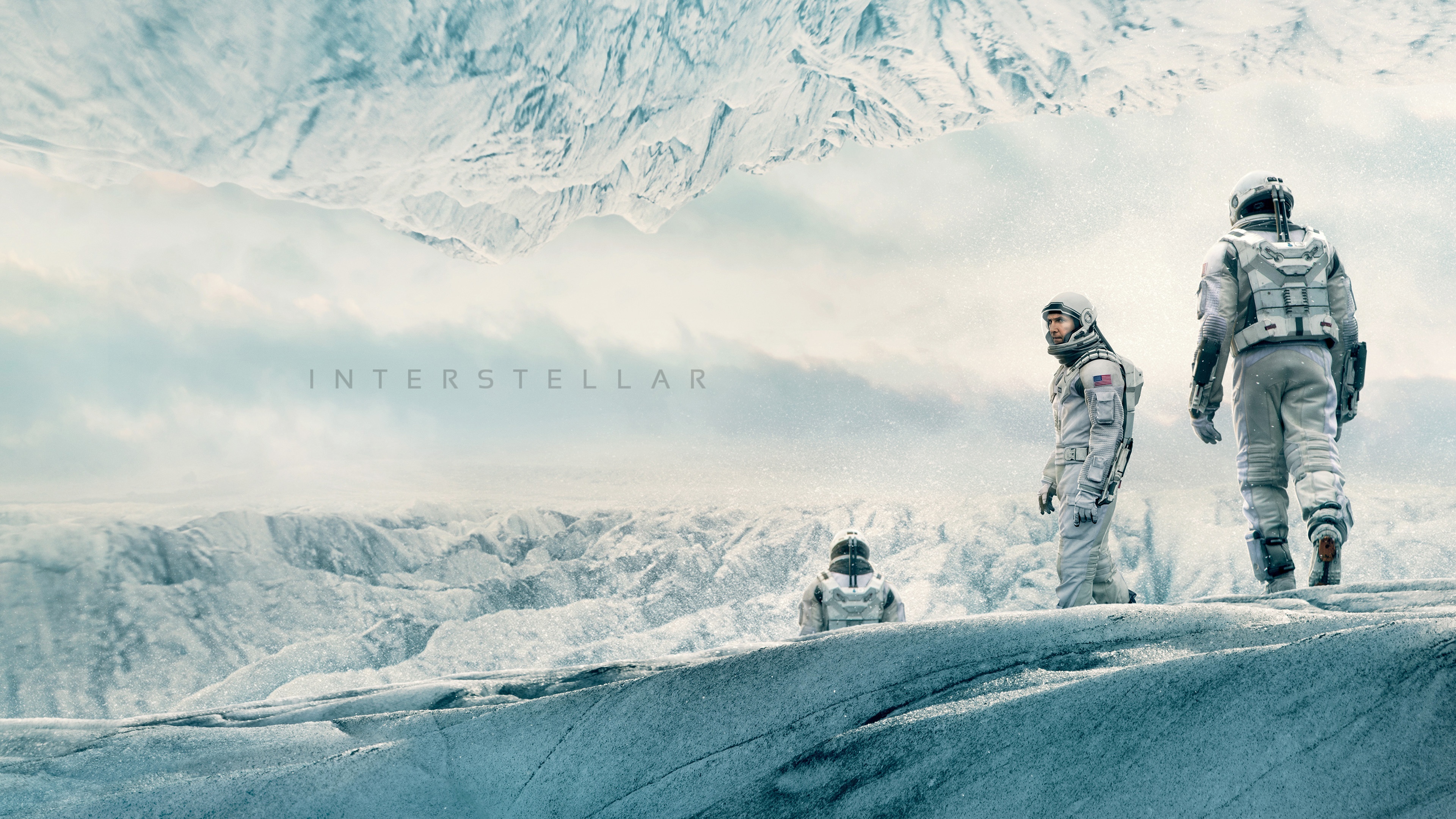 Interstellar: A team of explorers traveling through a wormhole in space. 3840x2160 4K Background.