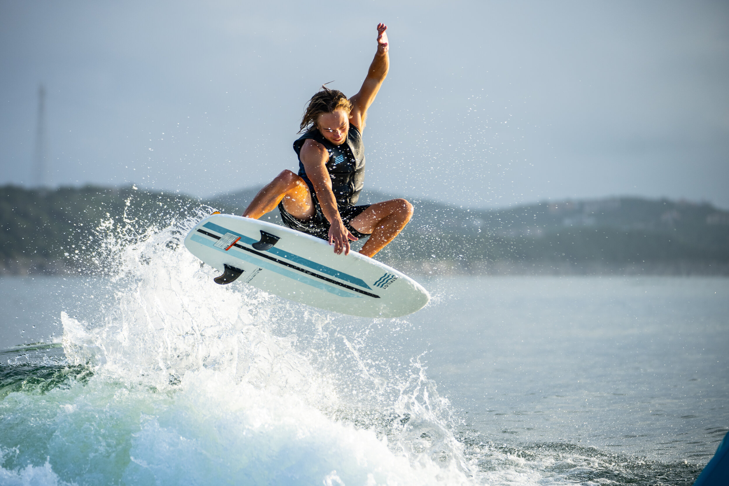 Wakesurfing, Thrilling watersport, Professional photographer, Action-packed shots, 2500x1670 HD Desktop