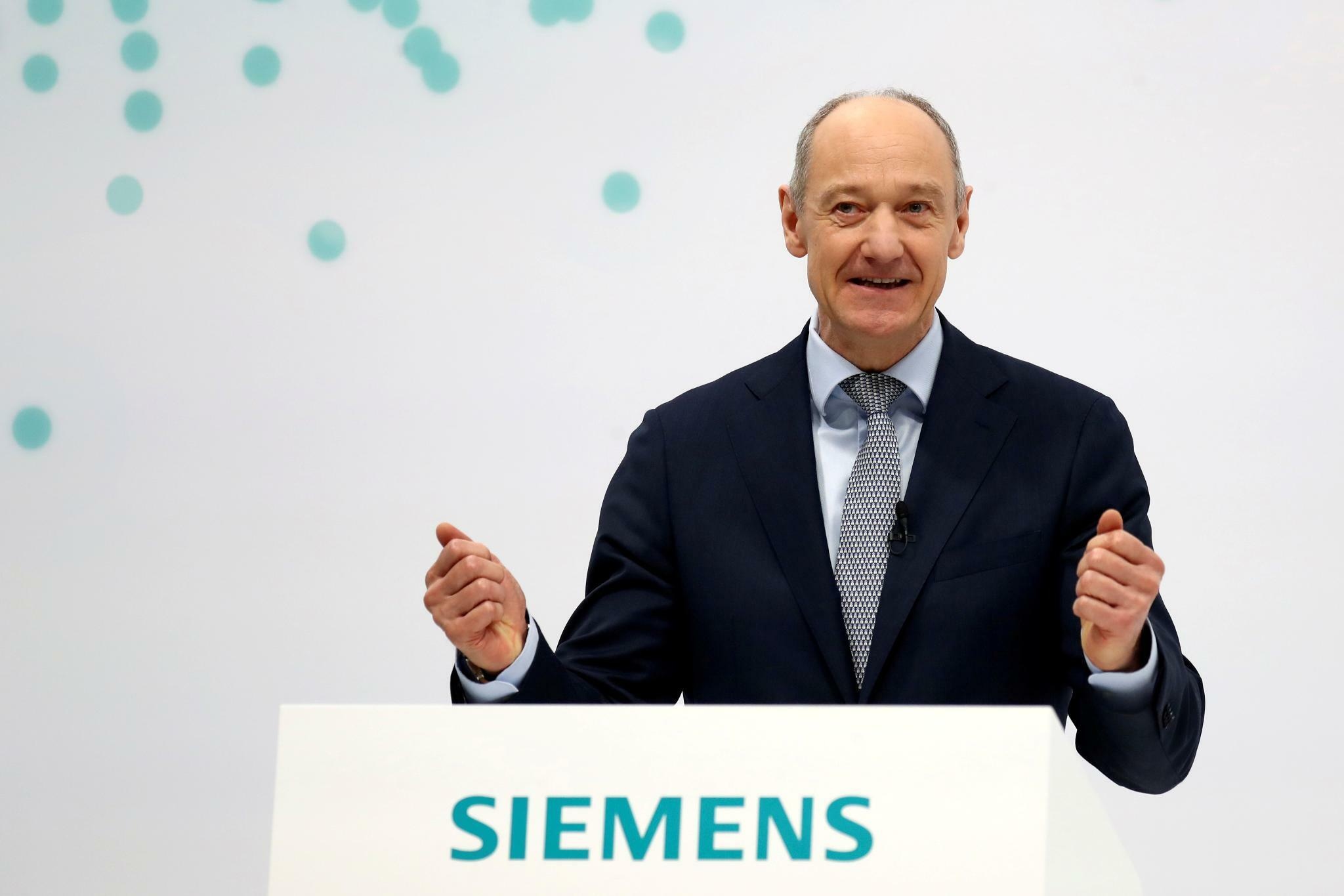 Siemens: Roland Busch, The President and Chief Executive Officer of Siemens AG. 2050x1370 HD Background.