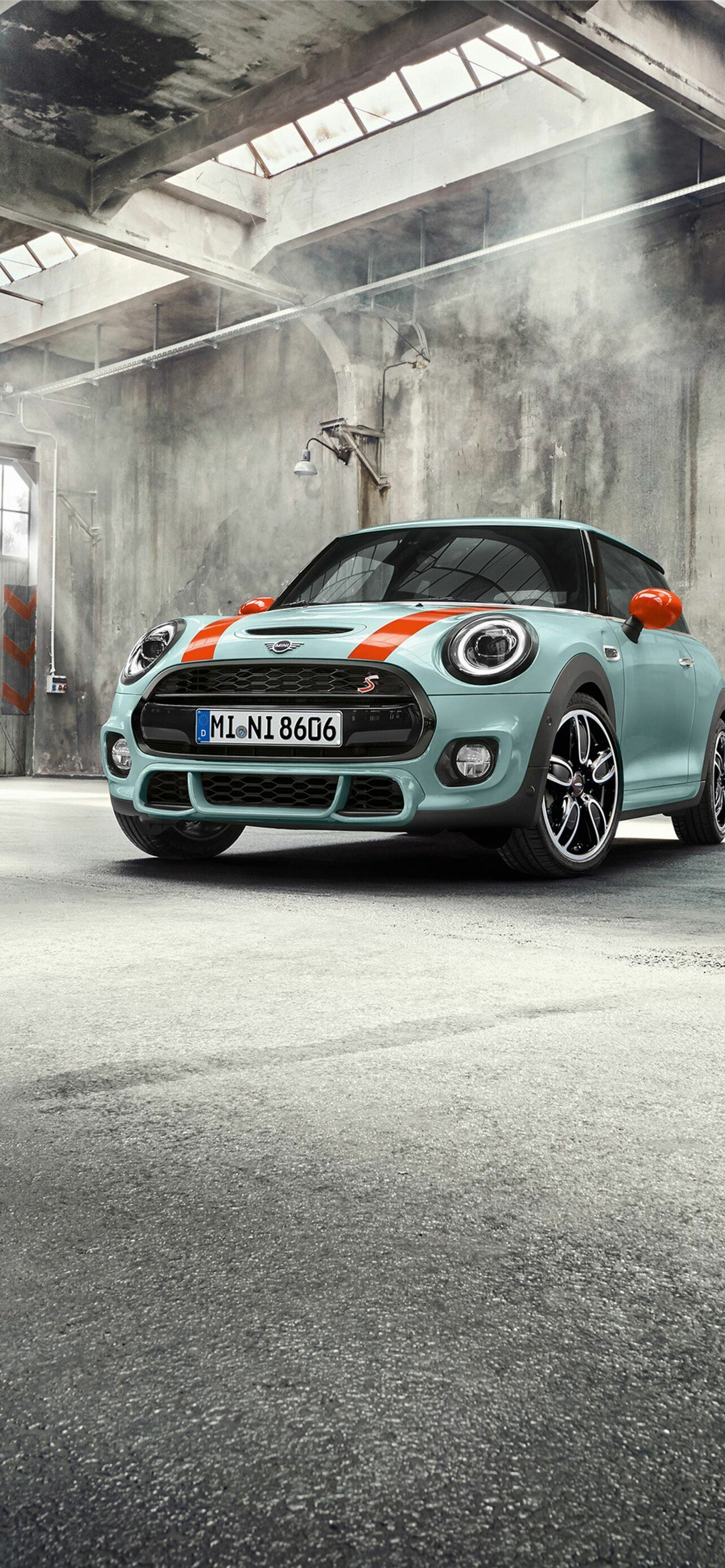 MINI Cooper: The Convertible and Countryman models are assembled at VDL Nedcar in Born. 1290x2780 HD Background.
