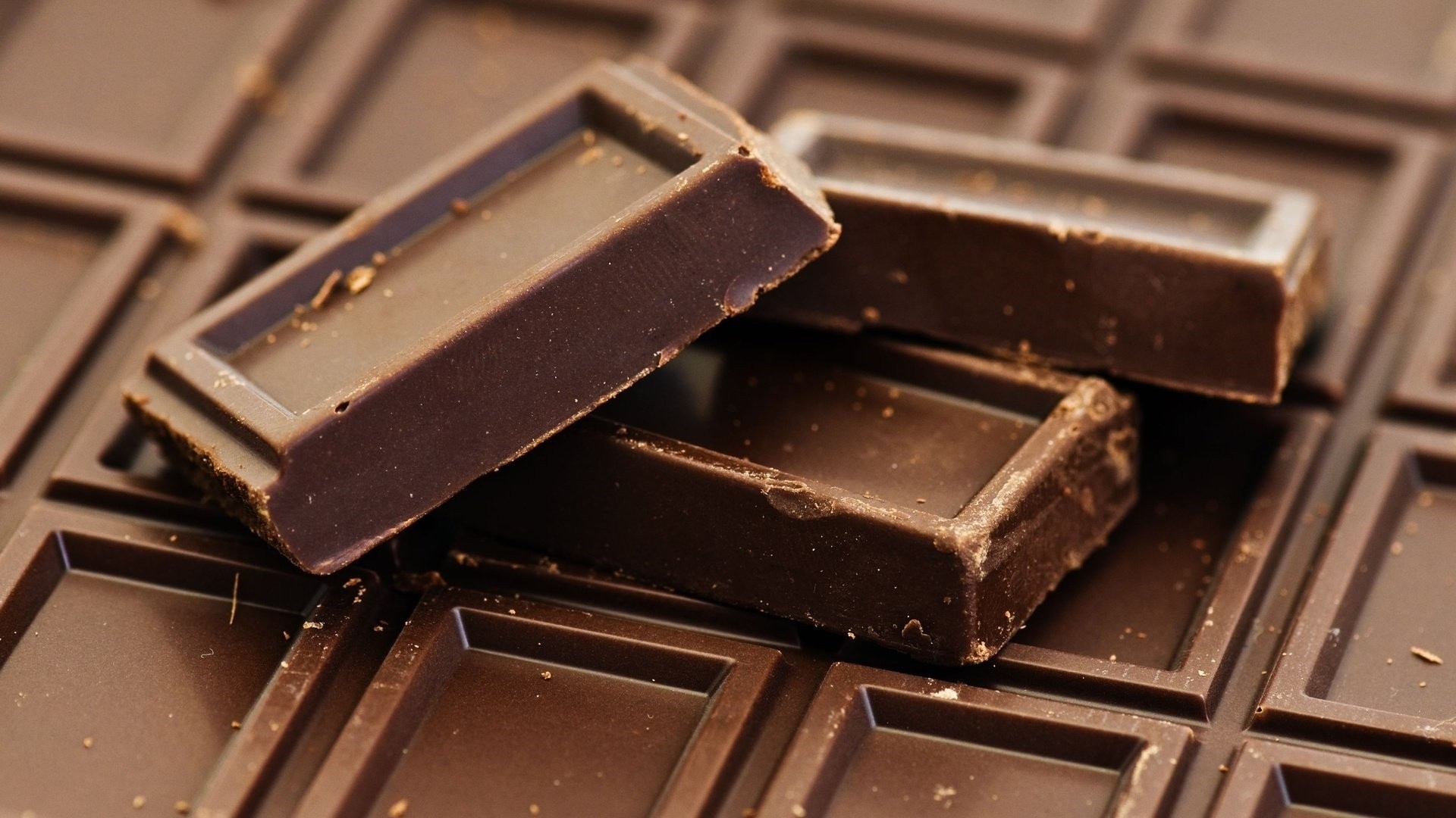Chocolate: Made from the kernels of fermented and roasted cocoa beans. 1920x1080 Full HD Background.