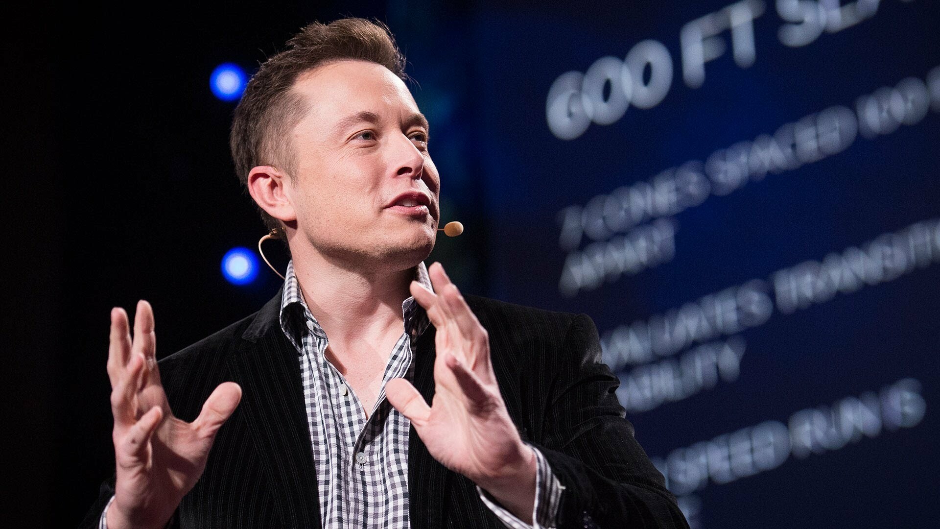 Elon Musk: An American entrepreneur who co-founded PayPal and established SpaceX. 1920x1080 Full HD Background.