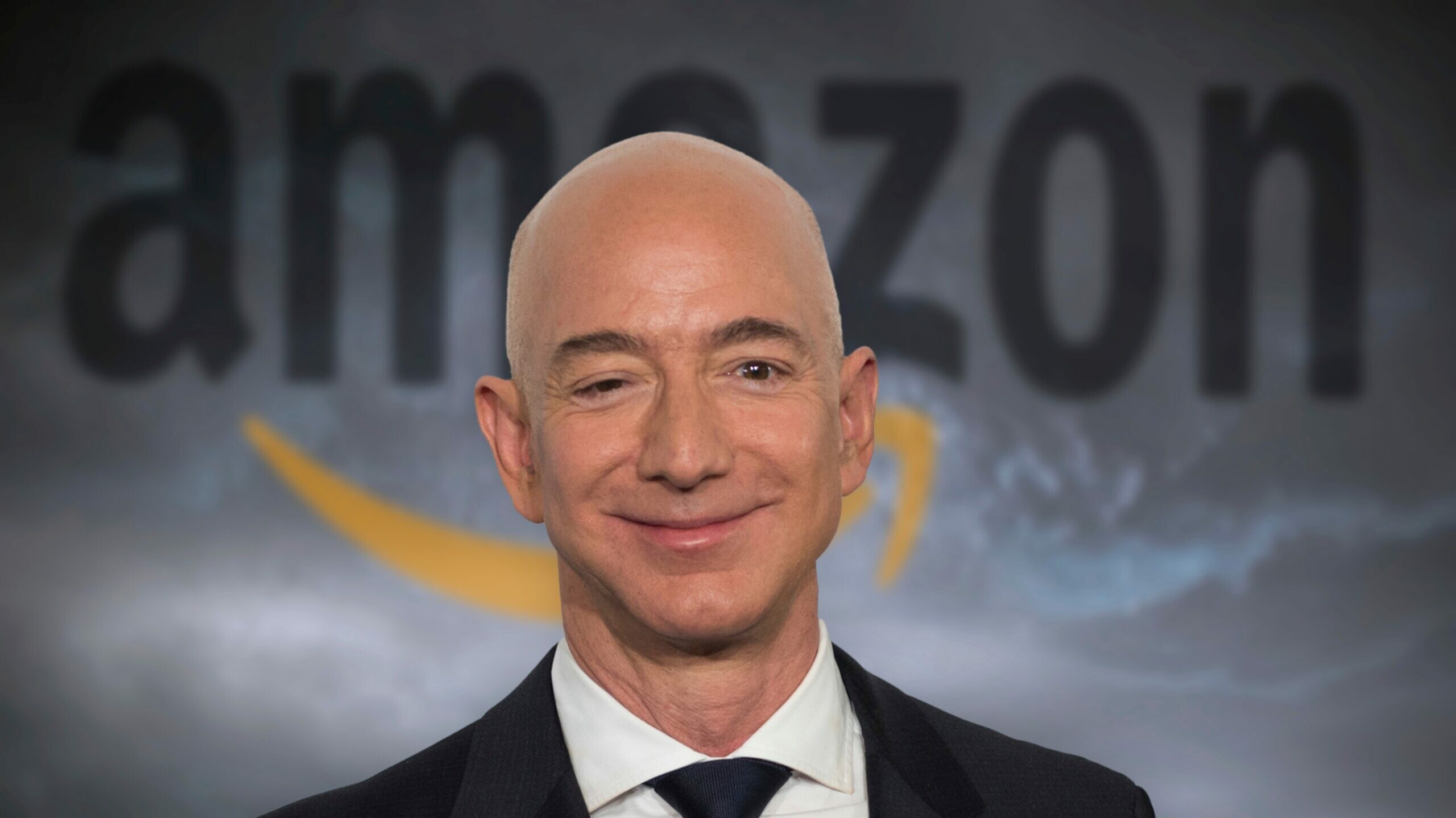 Jeff Bezos: The first person in modern history to accumulate a fortune of over $100 billion. 2560x1440 HD Wallpaper.