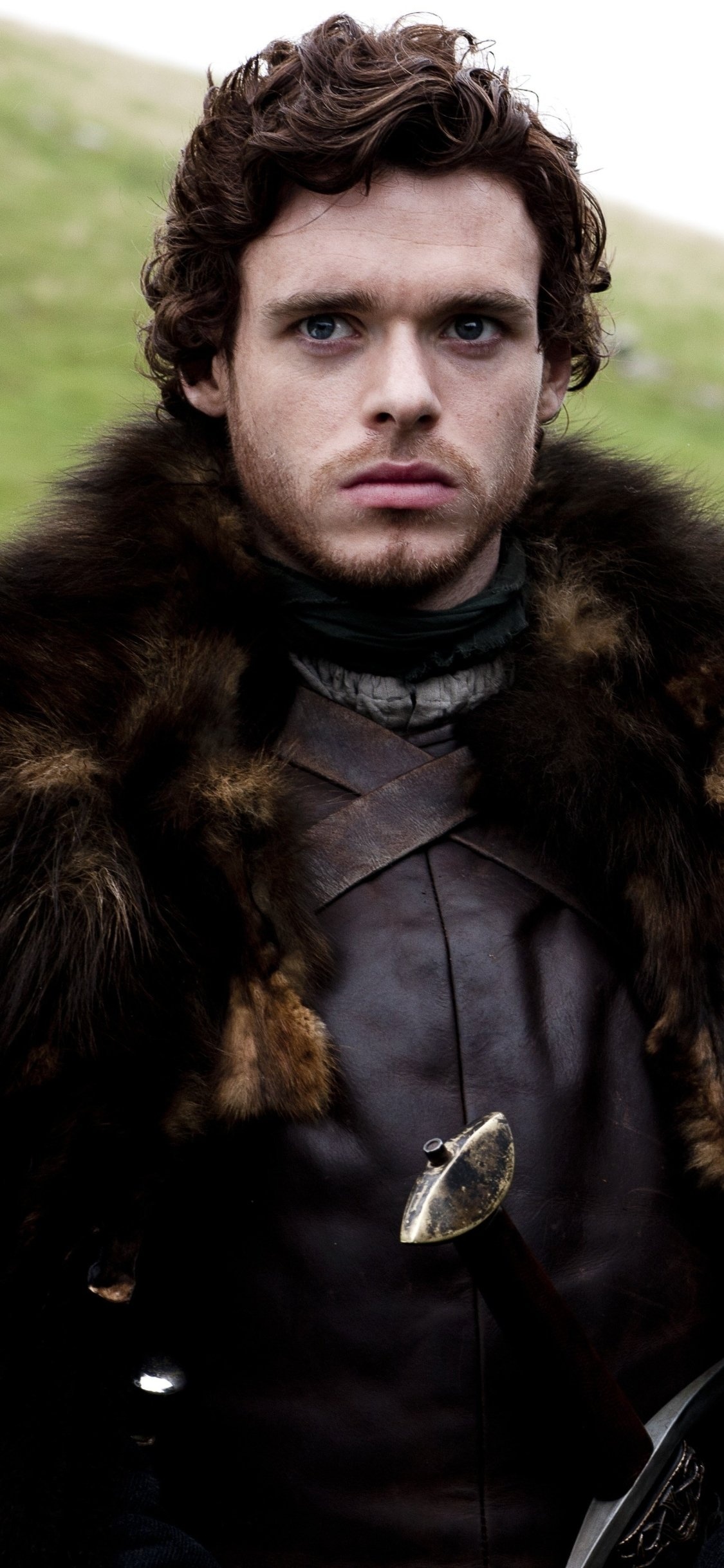 Richard Madden: TV show, The eldest son and heir of Lord Eddard Stark of Winterfell and Eddard's wife Lady Catelyn Stark. 1130x2440 HD Background.