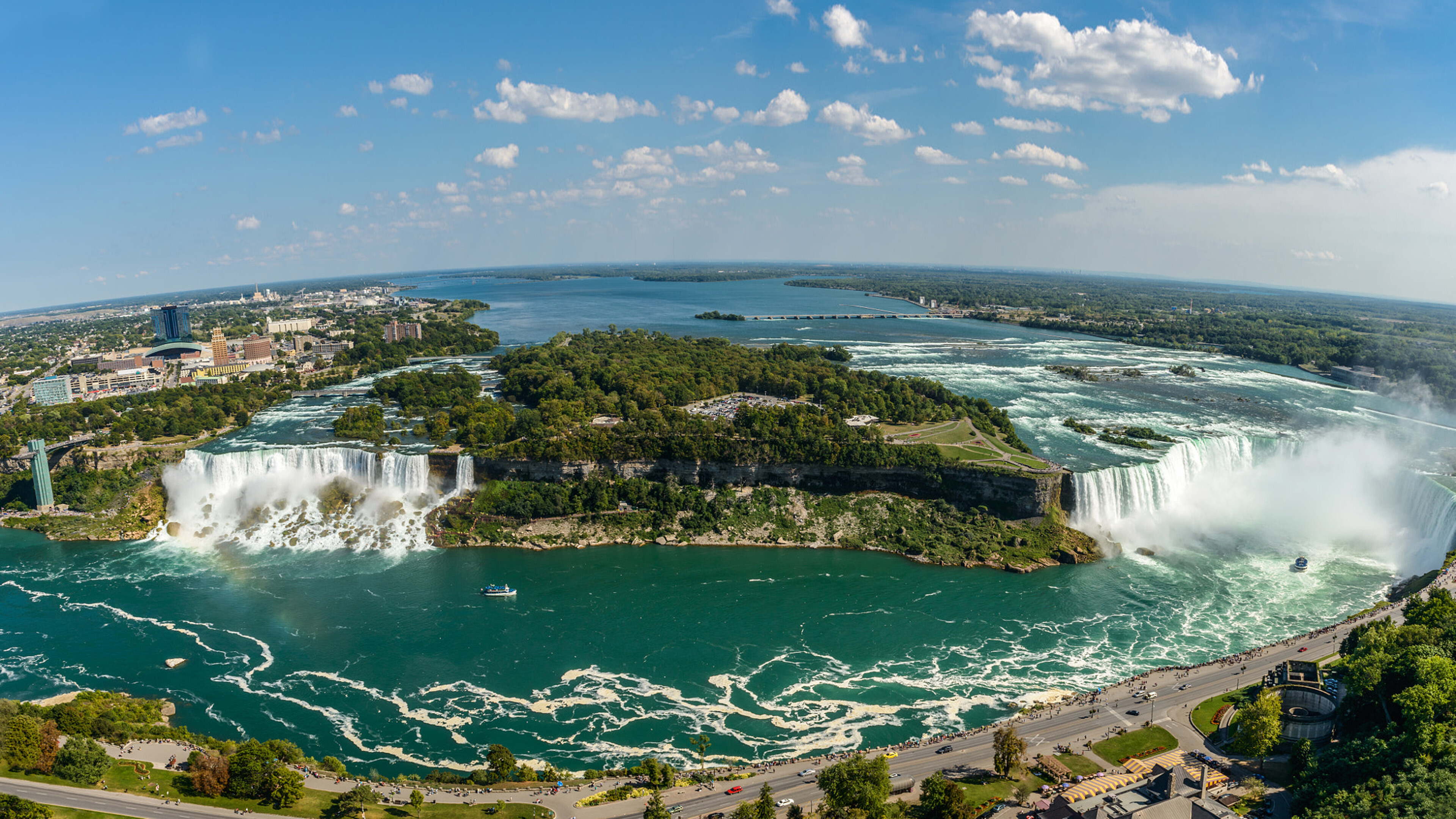Niagara Falls: The largest of the three is Horseshoe Falls, which straddles the international border of the two countries, Canada. 3840x2160 4K Background.