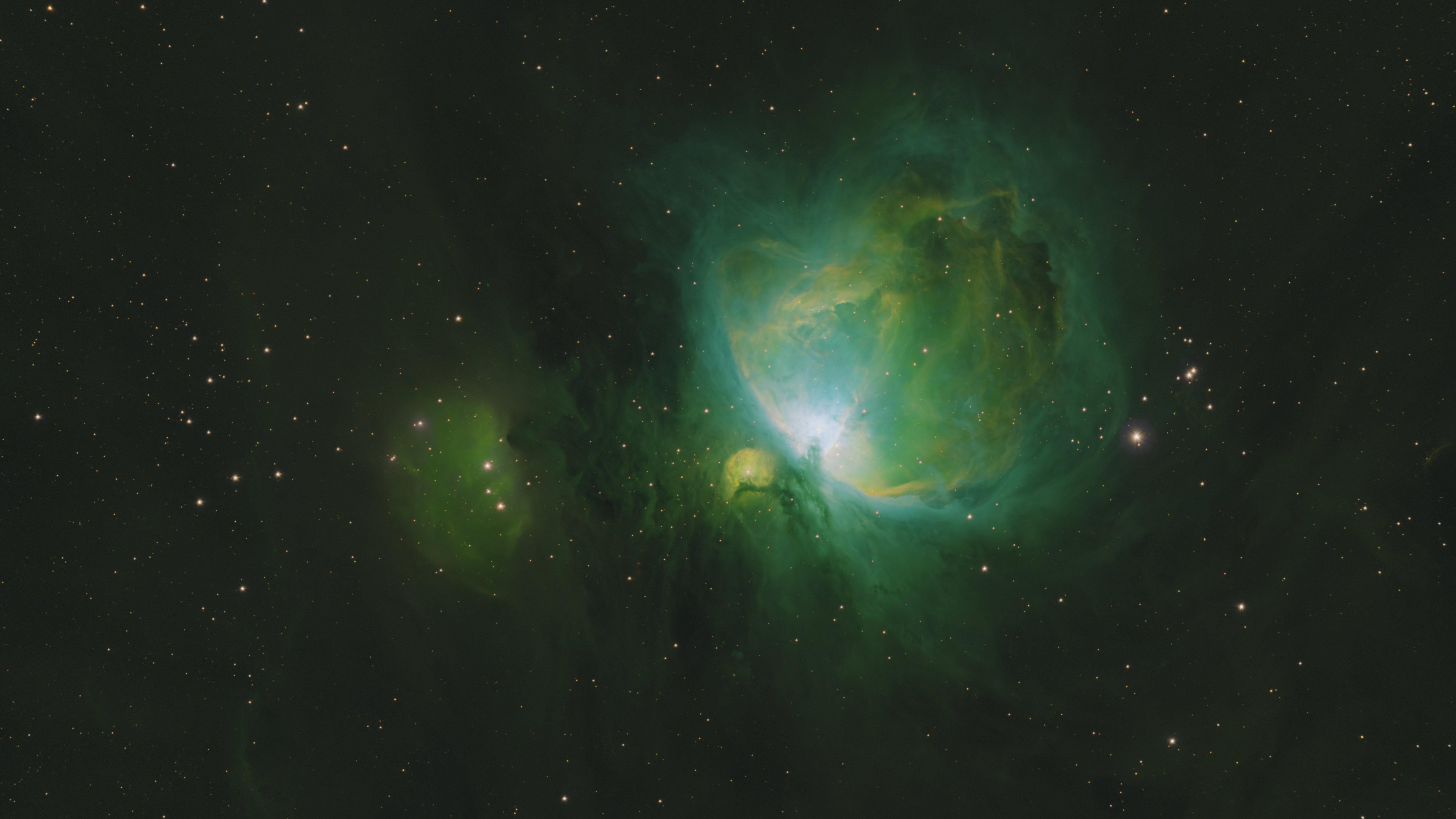 Green Nebula: The Orion Nebula, Messier 42, South of Orion's Belt in the constellation of Orion. 3840x2160 4K Background.
