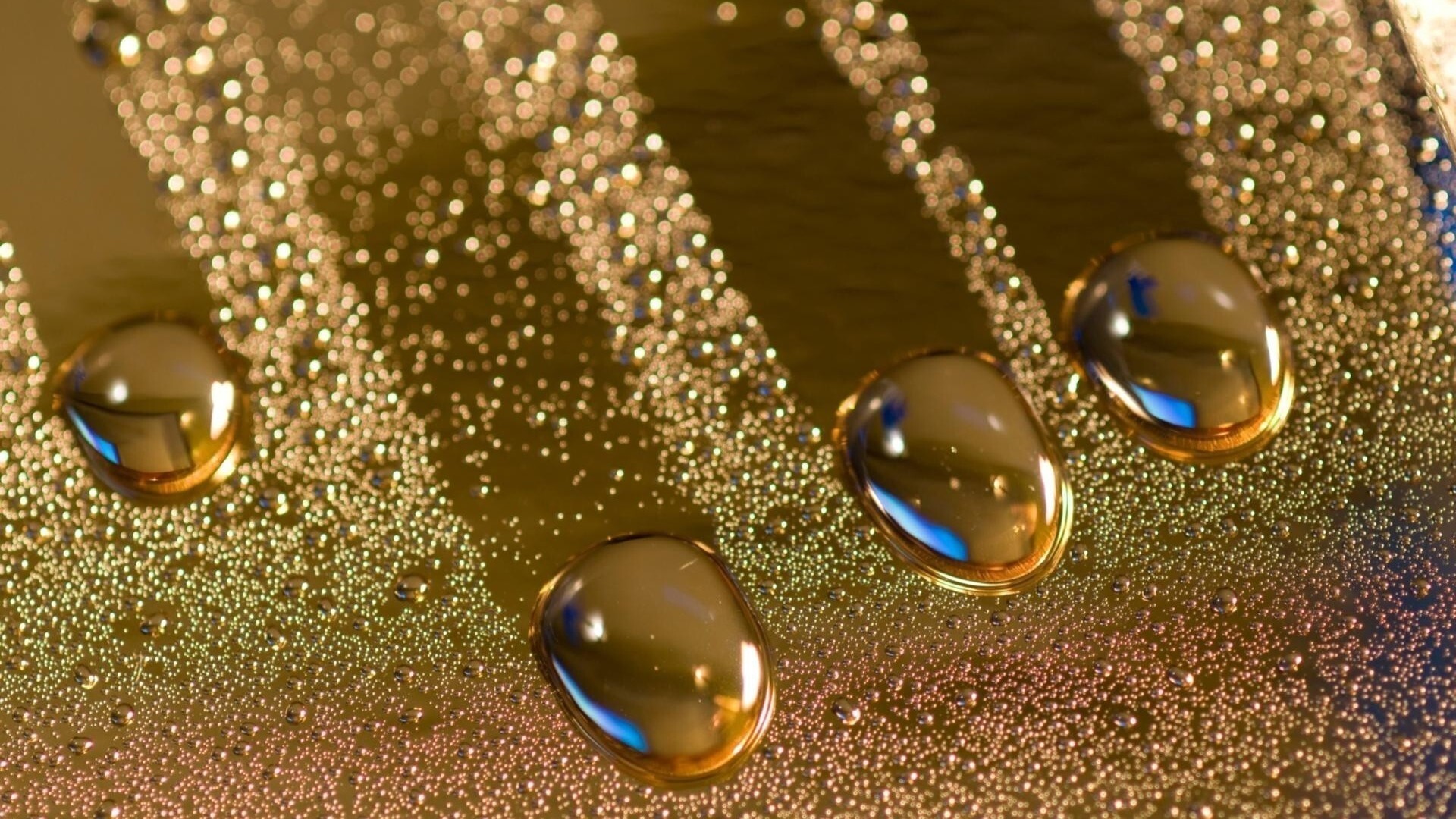 Gold Foil: Water on the gold-gilded surface, Decoration of pottery, porcelain, and glass. 1920x1080 Full HD Wallpaper.
