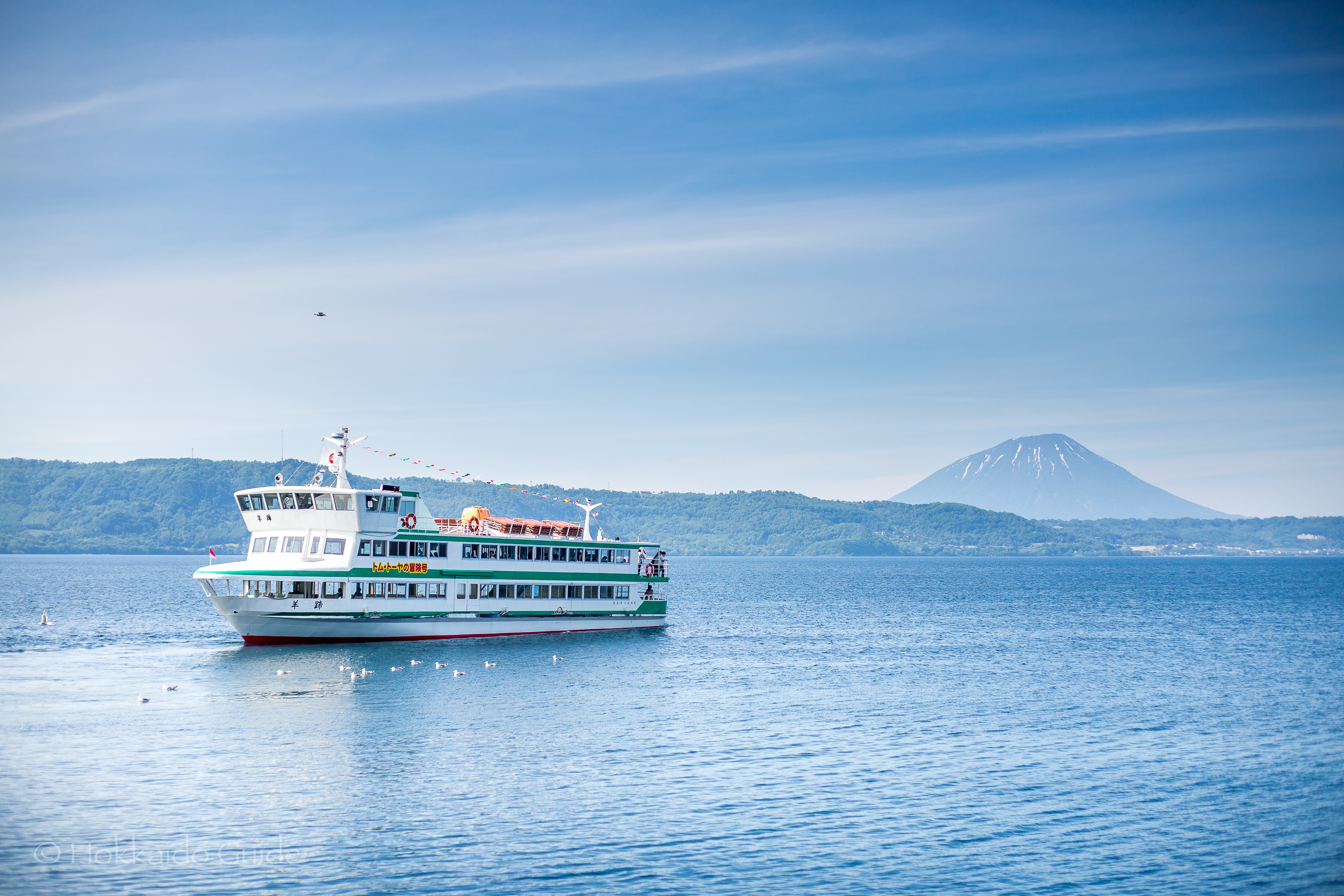 Ferry: Lake Toya, A water taxi, Flat-bottomed vessel. 2800x1870 HD Wallpaper.