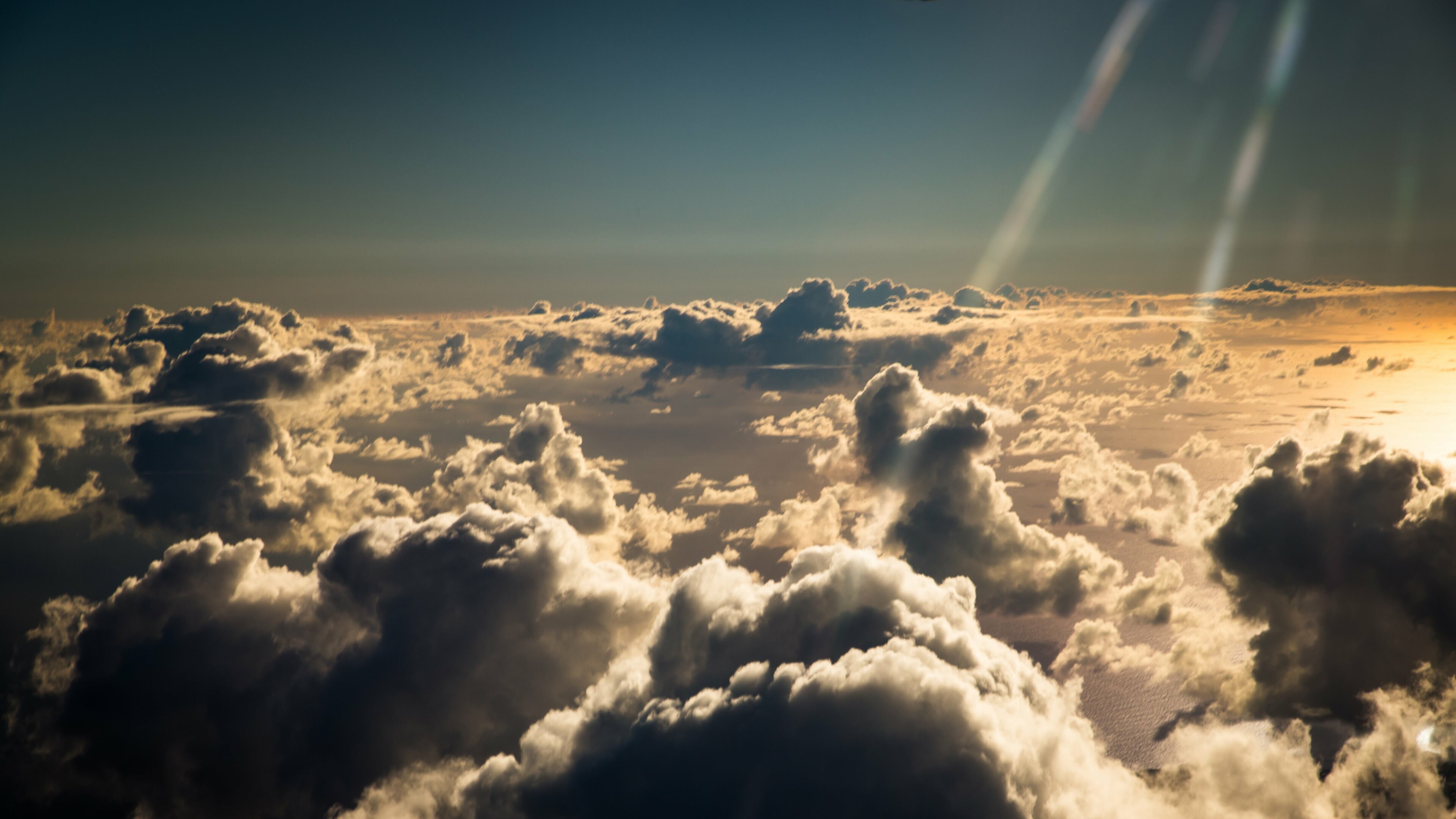 Clouds: A visible mass of condensed watery vapour floating in the atmosphere. 3840x2160 4K Background.