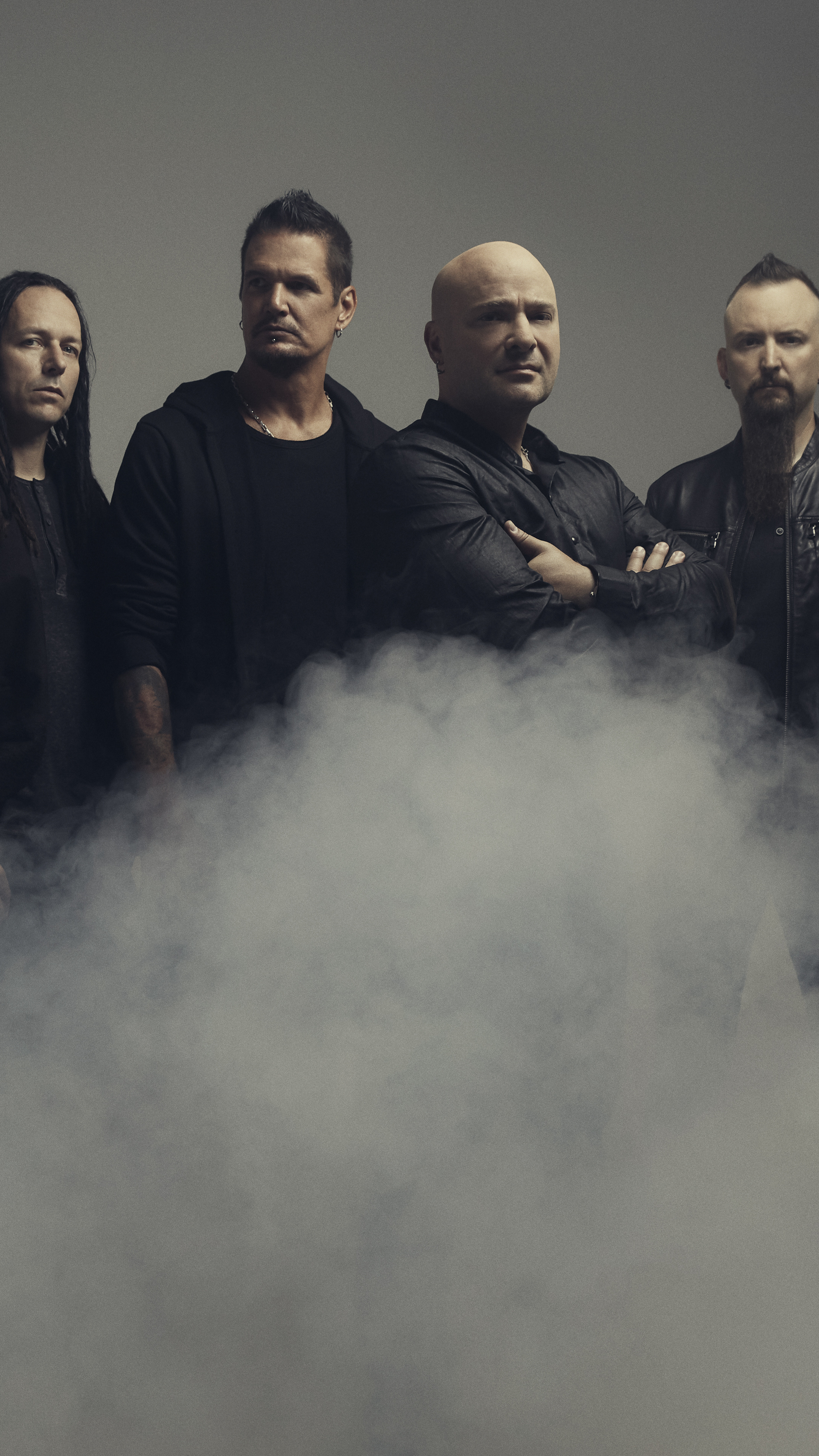 Music Band: Disturbed, An American heavy metal group from Chicago, David Draiman, John Moyer, Mike Wengren. 2160x3840 4K Background.